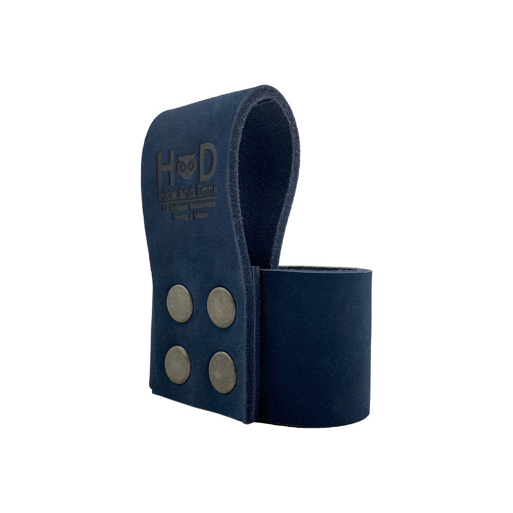 Large Hammer Holster by Hide & Drink, showcasing its deep brown hue and full grain leather finish. A multi-functional hammer holder with a belt loop designed for craftsmen. Artisan-created in La Antigua Guatemala ensuring fine quality and durability.