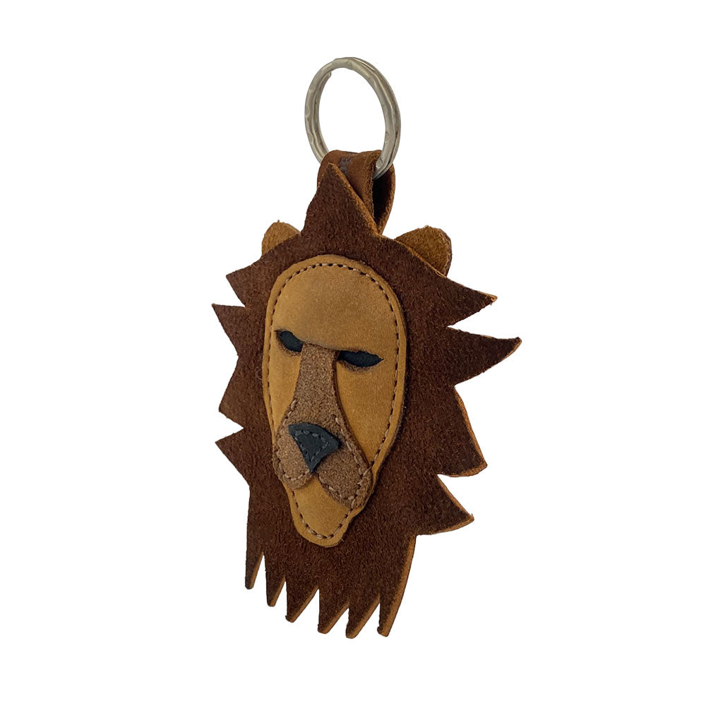Side view of the Lion Keychain by Hide & Drink, crafted from premium suede leather with intricate details. This artisan key ring is a stylish accessory that embodies the Leo zodiac sign, handmade in La Antigua Guatemala & Oaxaca Mexico.
