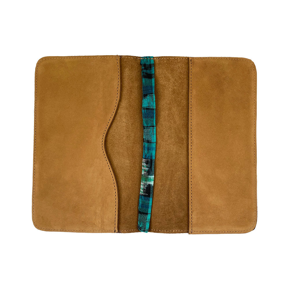 Front view of a brown Journal Cover for Moleskine Cahier L (5 x 8.25 in.) by Hide & Drink showcasing its rich color. Ideal for large size (5 x 8.25 in.) notebooks, this refillable cover is a beautiful protector made from full grain leather.