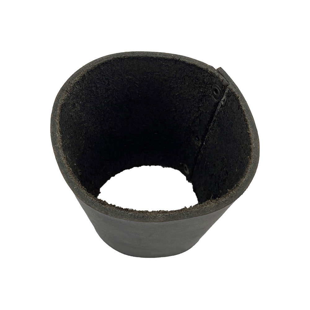 Inside view of the black leather Pint Sleeve from Hide & Drink, showcasing the unique hand cut and sewn craftsmanship. Ideal for maintaining beverage temperature, this full grain leather piece is a classic gift choice, made in La Antigua Guatemala & Oaxaca Mexico.