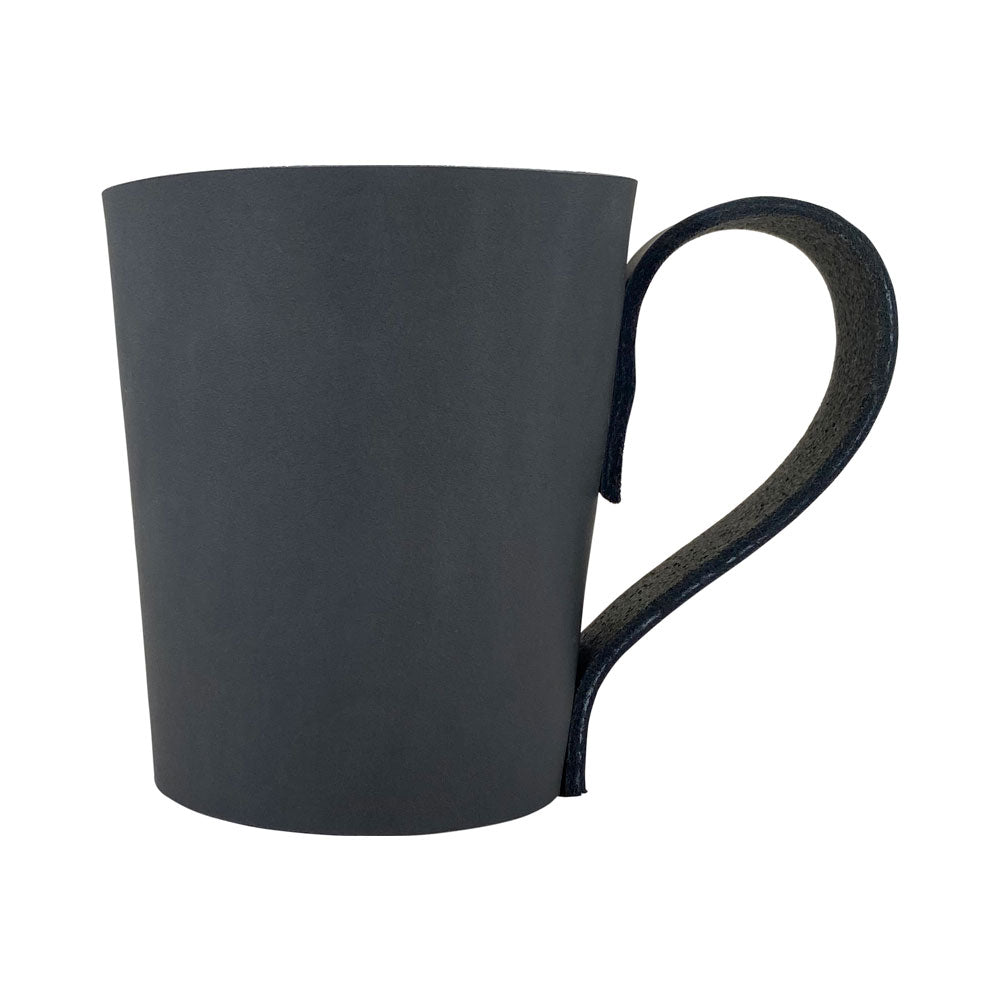 Chic Pint Sleeve with Handle by Hide & Drink featuring a stunning look and feel. Crafted from Full Grain Leather, this Hand Cut, Hand Sewn product embodies artisan quality in Small Batch Production, making it a standout addition for bars and pubs.