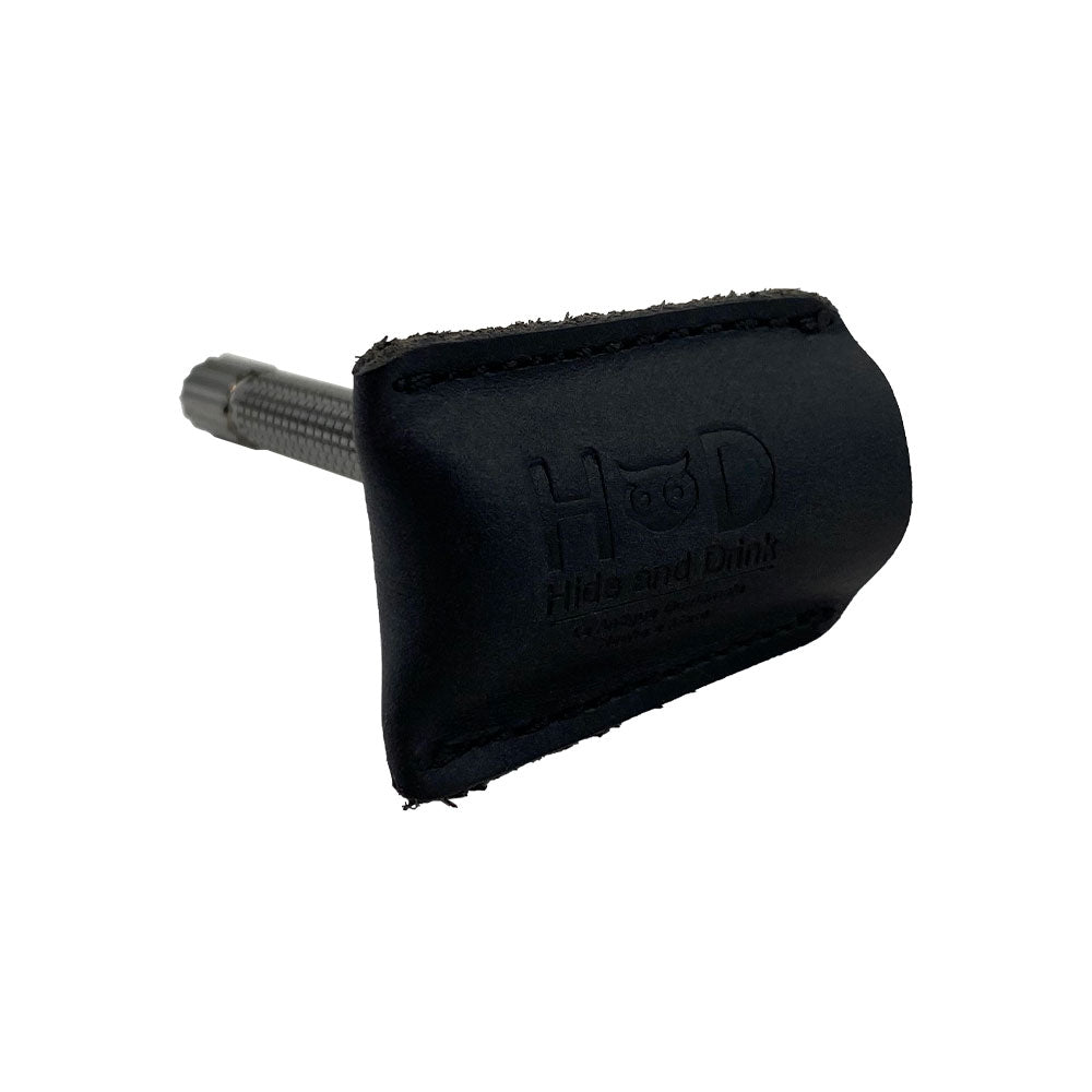 Stylish Razor Head Cover by Hide & Drink, designed to fit over your double edge safety razor. This shaving travel cover is made of full grain leather, reflecting artisan craftsmanship with hand cut and sewn elements, handmade in La Antigua Guatemala & Oaxaca Mexico.