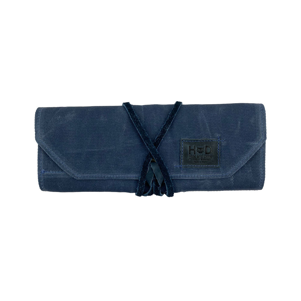 Hide & Drink Tool Roll showcases a versatile small tool roll-up bag with 10 slots, made from robust full grain leather. This portable carry-on pouch is essential for woodworking tools organization, enhancing storage in any workshop. Handcrafted in La Antigua Guatemala & Oaxaca Mexico, reflecting artisan quality.