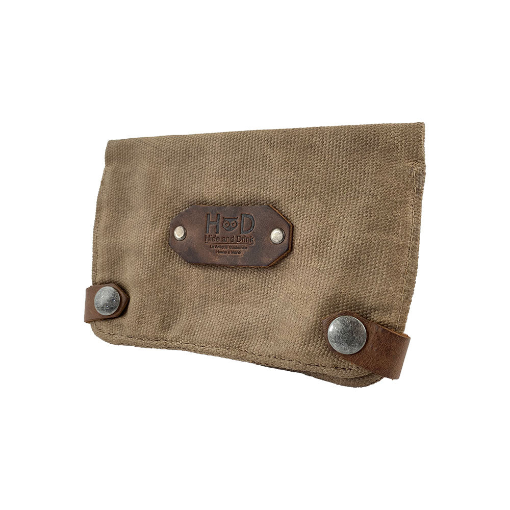 Side view of the Hide & Drink Tobacco Pouch Waxed Canvas showing its sturdy construction and practical design. This tobacco pouch and field notes case is perfect for classic storage, reflecting small batch production and artisan craftsmanship.