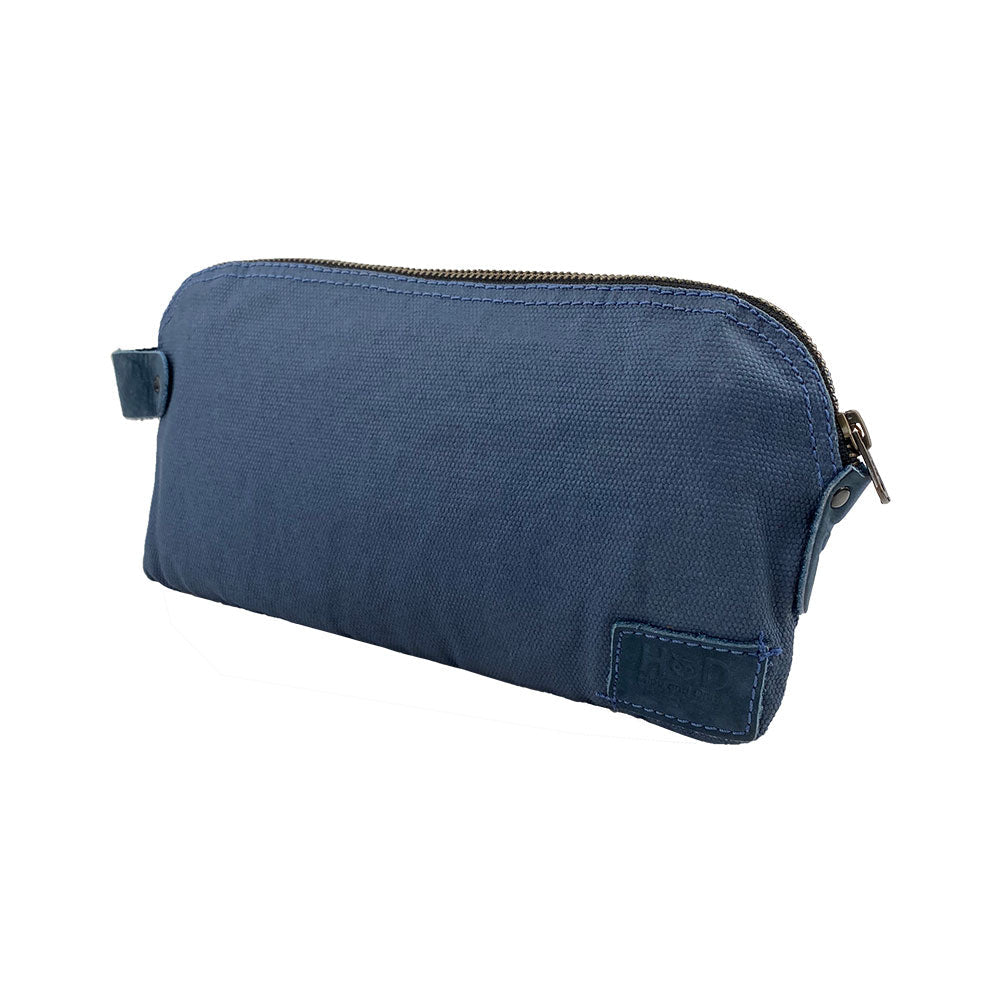 Dopp Kit Utility Bag by Hide & Drink demonstrating a polished design with rustic appeal. This artisan Dopp Kit Utility Bag serves as a versatile travel companion, crafted from full grain leather with an emphasis on hand cut and hand sewn quality, handmade in La Antigua Guatemala & Oaxaca Mexico.