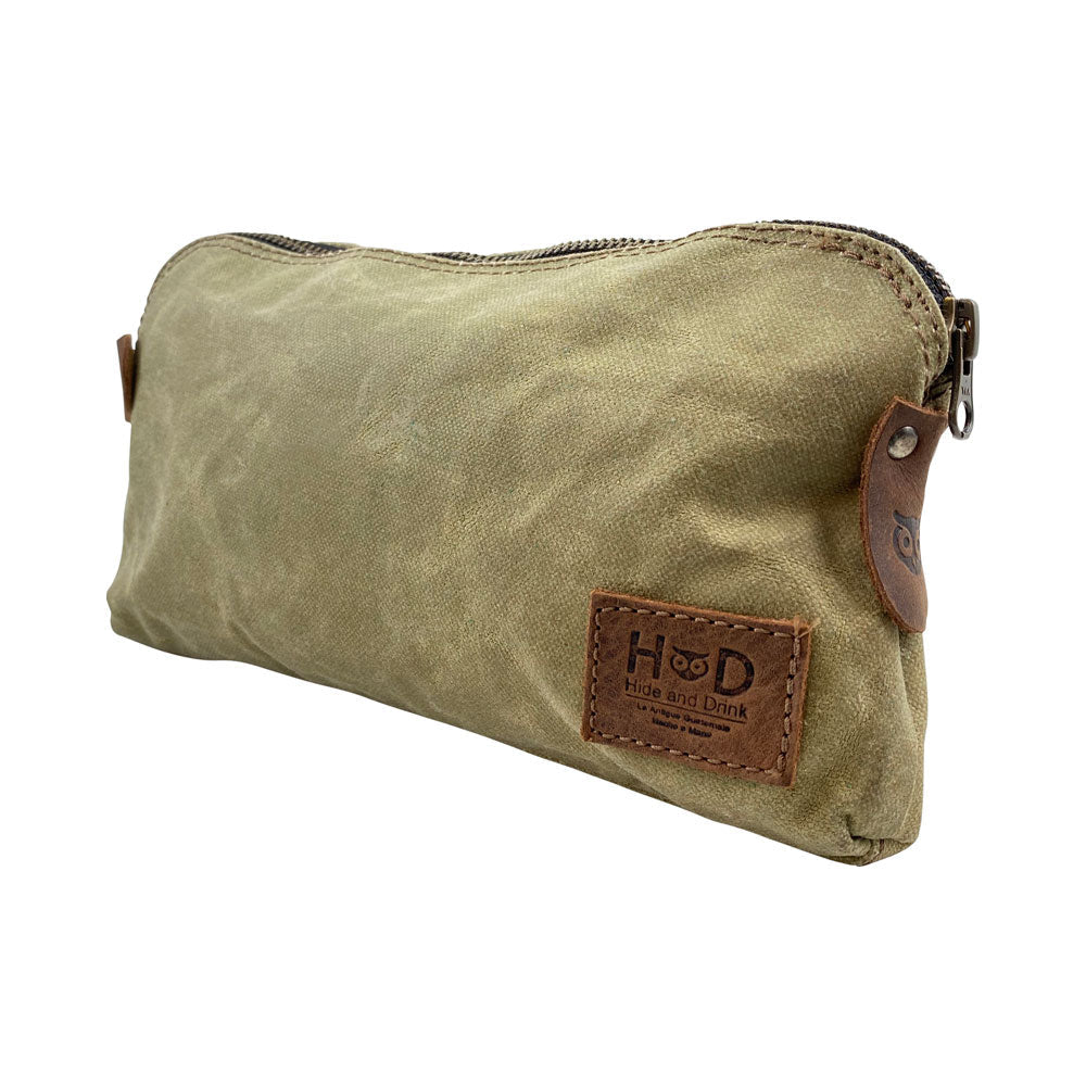 Dopp Kit Utility Bag by Hide & Drink emphasizing versatility in design and usage. This large rustic all-purpose Dopp Kit Utility Bag for cords & chargers is crafted from full grain leather, showcasing artisan skills through small batch production and hand sewing, handmade in La Antigua Guatemala & Oaxaca Mexico.