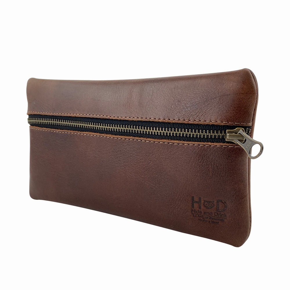 Hide & Drink Utility Cord Pouch with a top view highlighting its zipper system and craftsmanship. Ideal for use as an all-purpose utility & charger case for MacBook, iPad & Laptop, this pouch also serves as a slick cable organizer, handmade in La Antigua Guatemala & Oaxaca Mexico.