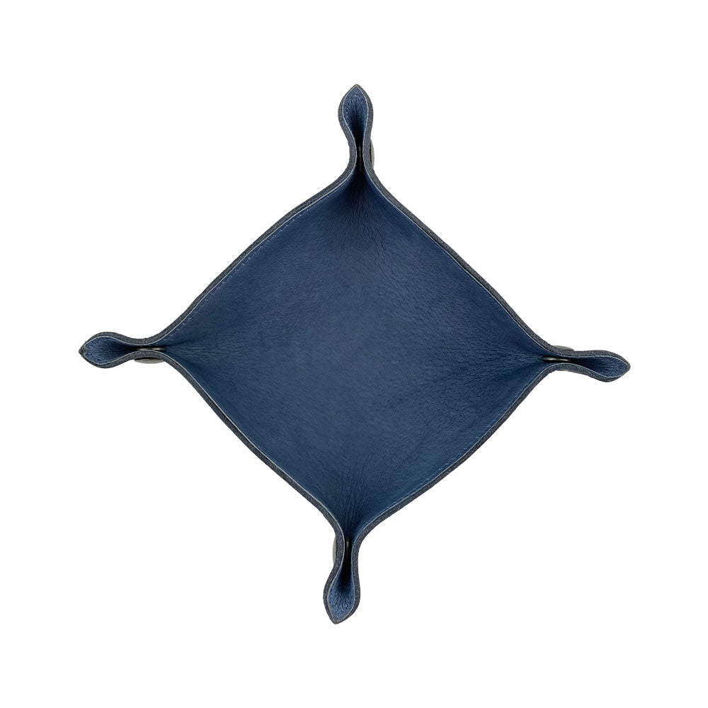 Top view of the Valet Tray with Sheep Skin by Hide & Drink, showcasing its handcrafted design. This artisanal catchall is perfect for organizing personal items, featuring a unique shape and made from Full Grain Leather & Sheepskin. Ideal for home and travel essentials, this small batch production piece is hand cut, hand sewn, and fire branded in La Antigua Guatemala & Oaxaca Mexico. Perfect as a change key wallet and coin box.