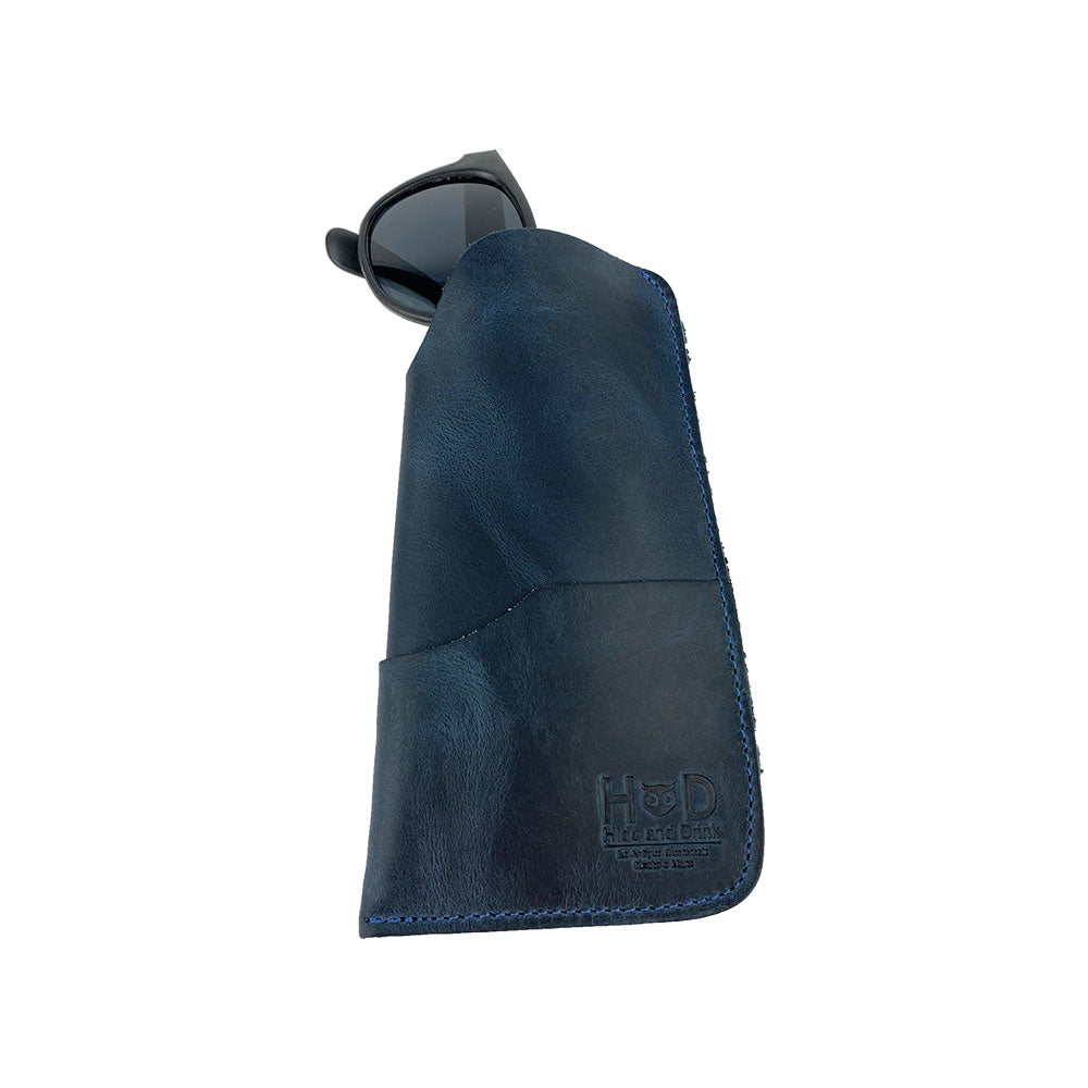 The Hide & Drink Sunglass Case & Wallet showcased beautifully, offering practicality and elegance. This Rustic Sunglasses Case & Wallet is crafted from Full Grain Leather, making it a chic glasses protector for travel, produced with care in La Antigua Guatemala & Oaxaca Mexico.