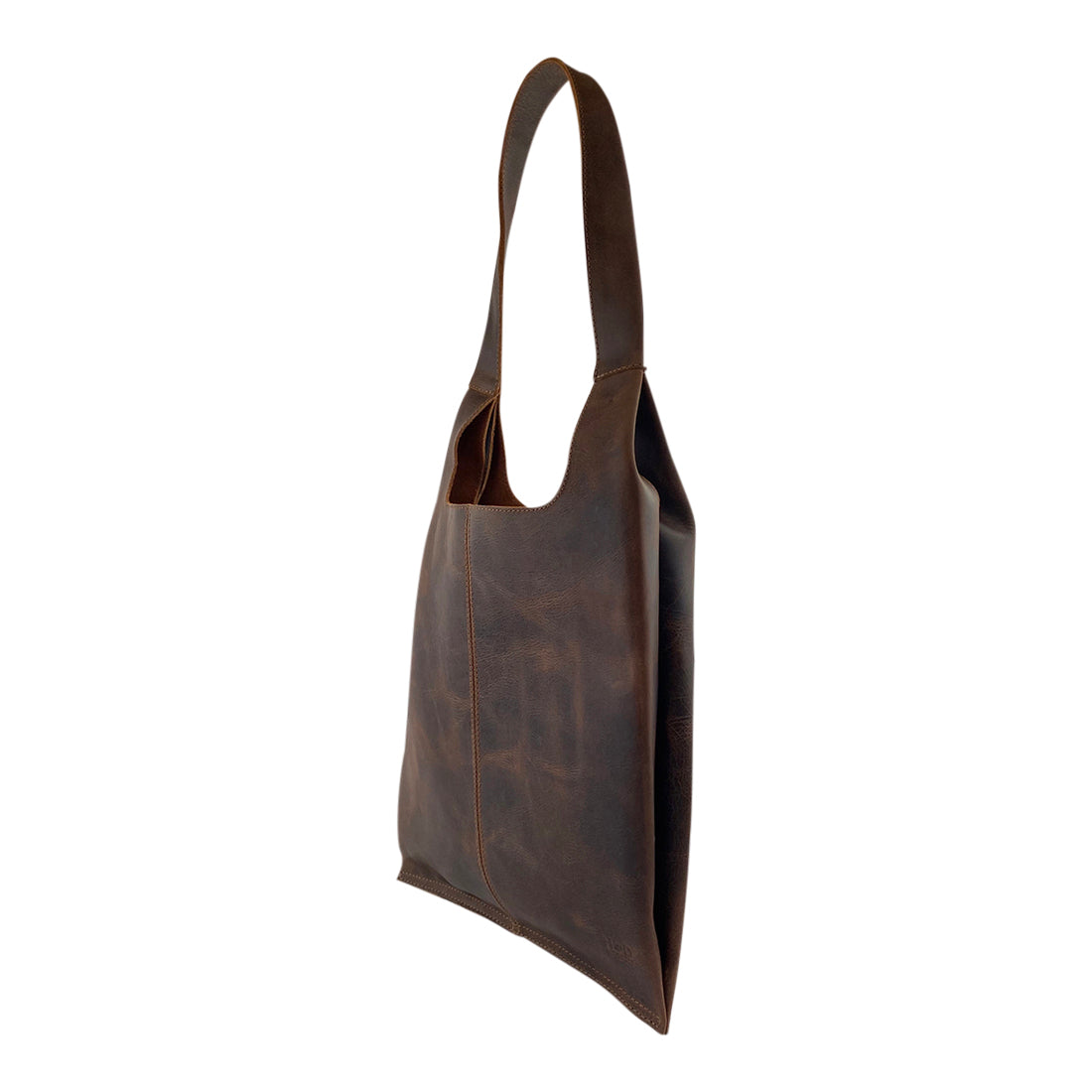 Side view of the Shoulder Bag for Laptop by Hide & Drink featuring a durable and stylish design suitable for a laptop. Made from high-quality full grain leather, this shoulder bag is a perfect travel companion. Artisan made in Oaxaca Mexico.