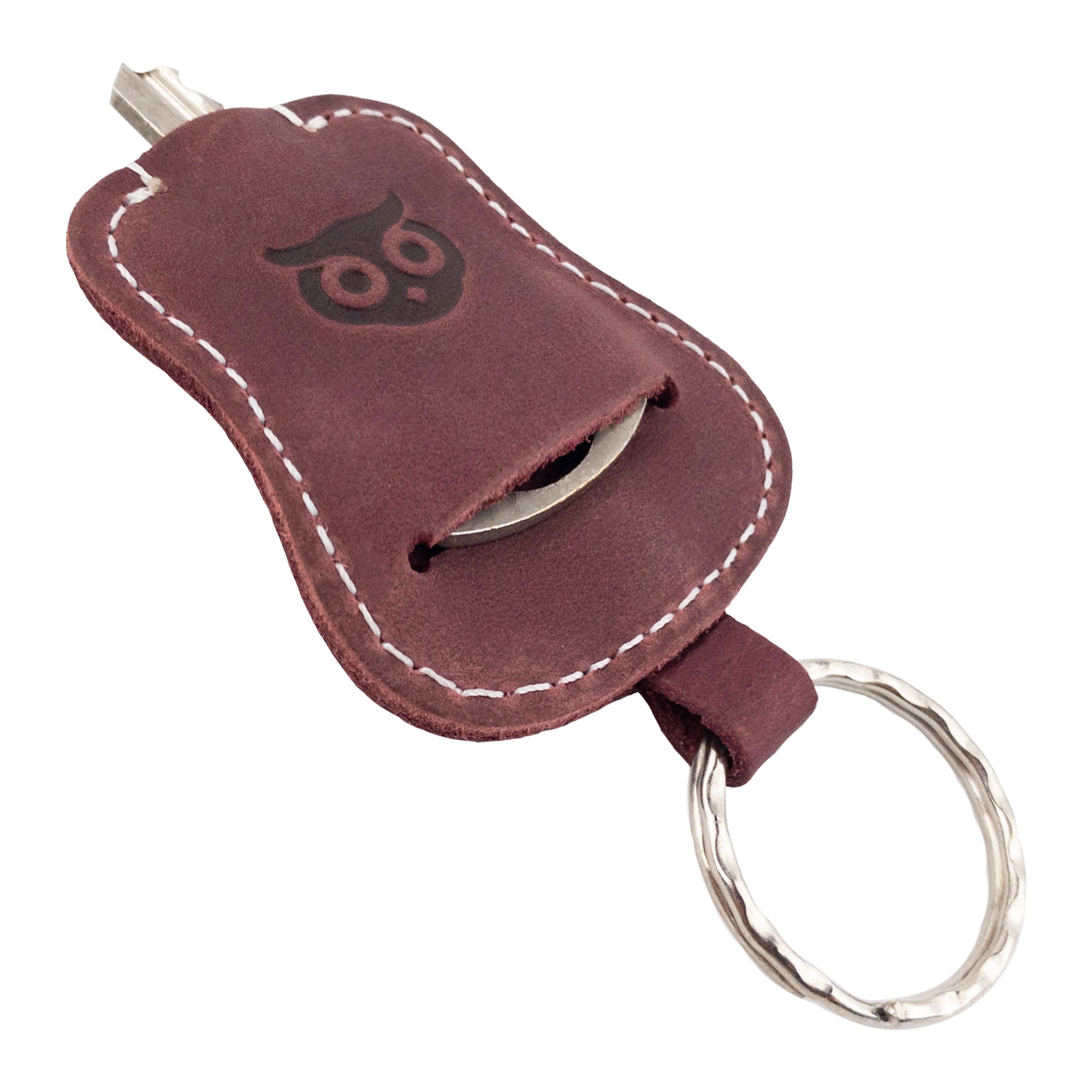 Stylish Guitar Keychain by Hide & Drink showing its versatility as a quintessential key holder. Handcrafted from Full Grain Leather, this keyring exemplifies artisan craftsmanship in small batch production from La Antigua Guatemala & Oaxaca Mexico.