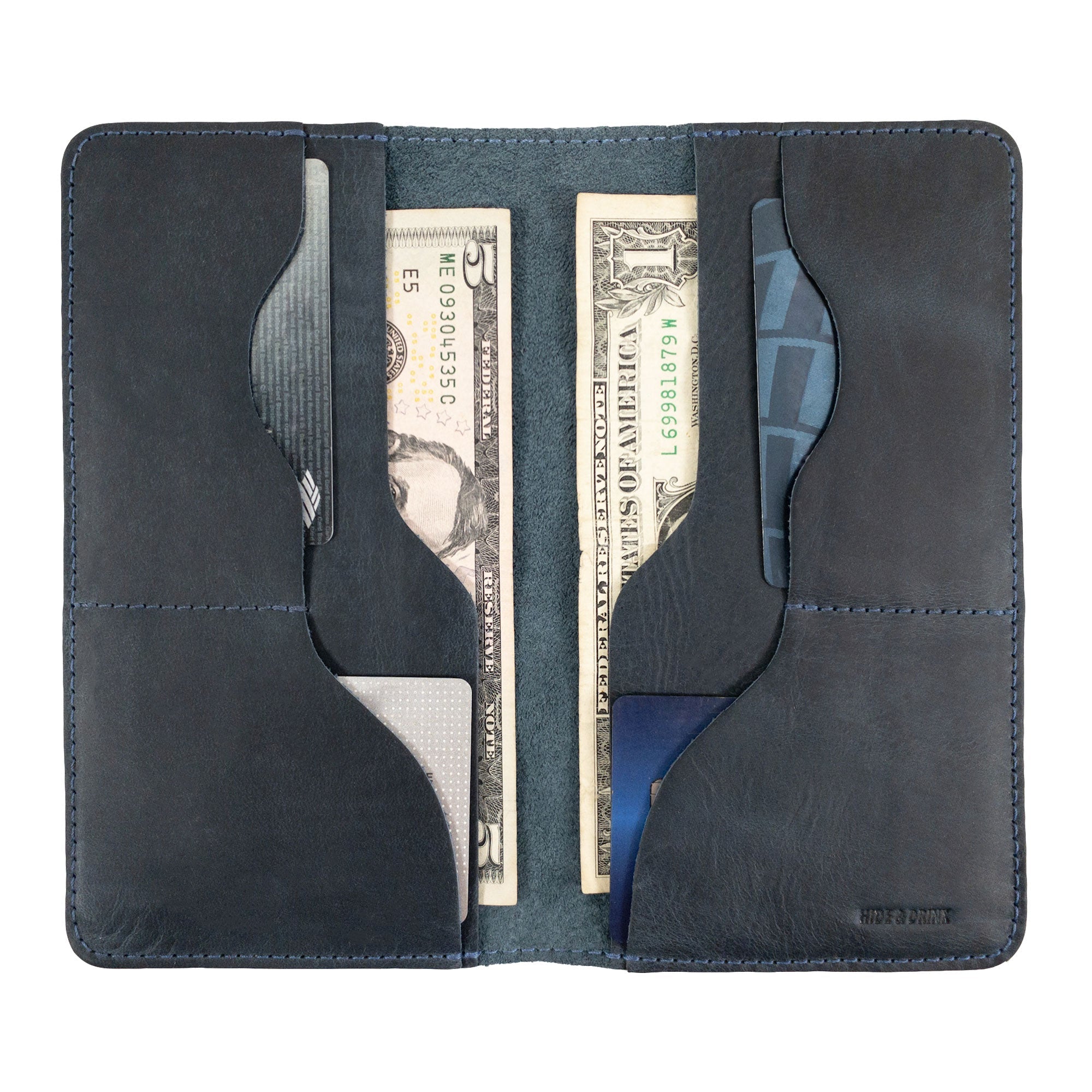 Hide & Drink Large Organizer Wallet presenting its high-quality leather and thoughtful design. This bifold wallet is a reliable travel accessory, featuring card slots and a flat money holder, handmade in La Antigua Guatemala & Oaxaca Mexico.