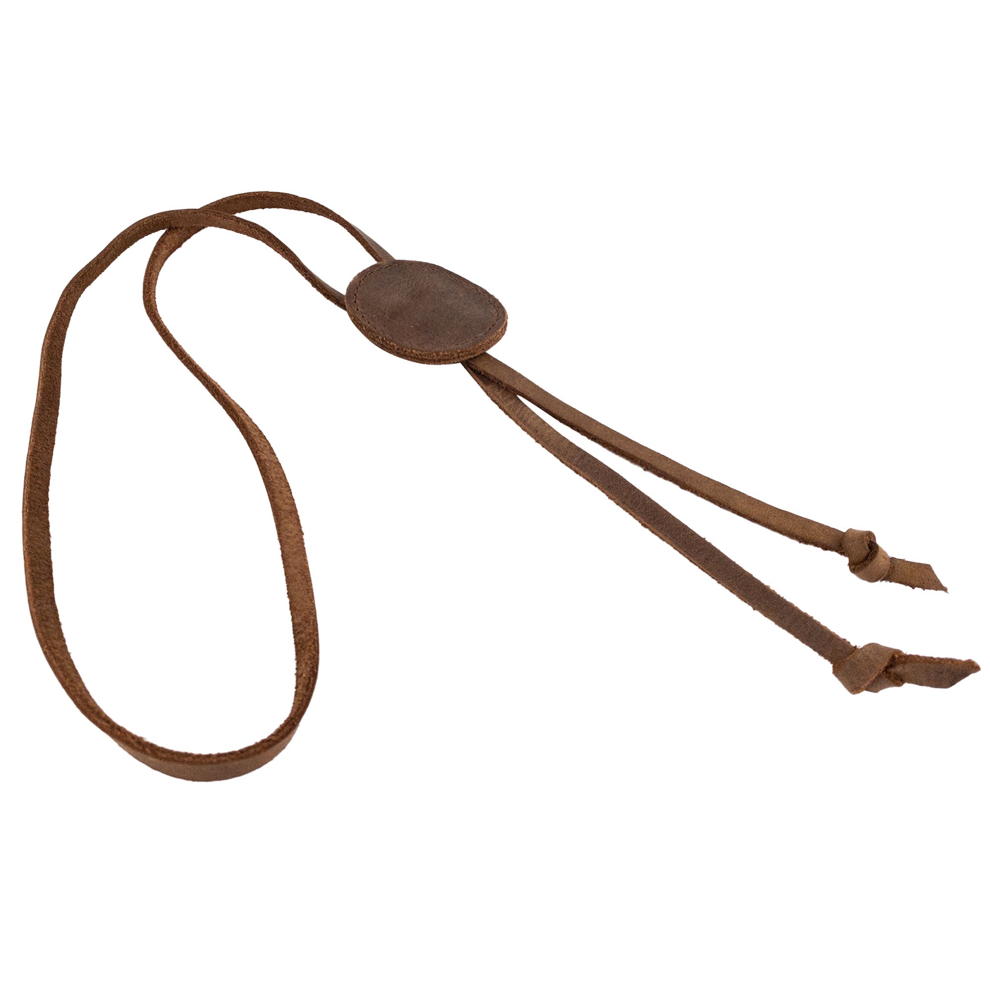 Stylish Cowboy Bolo Tie presented by Western Leather Works, designed in a round shape with genuine full grain leather. This handmade necktie accessory highlights craftsmanship through small batch production, hand cut and sewn techniques from La Antigua Guatemala & Oaxaca Mexico.