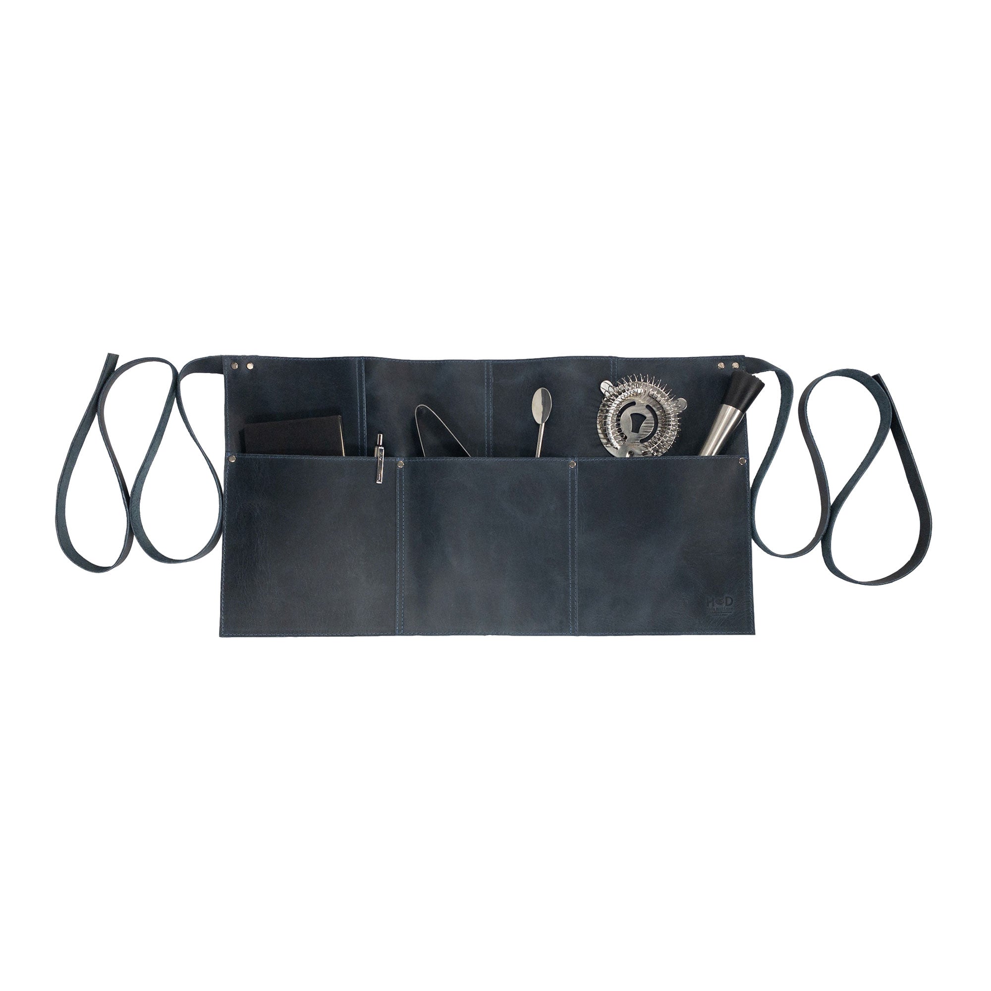 Close-up of the black Hide & Drink Barista Leather Waist Apron showcasing its features with riveted pockets, emphasizing its quality as waitress and waiter accessories, handmade in La Antigua Guatemala & Oaxaca Mexico.