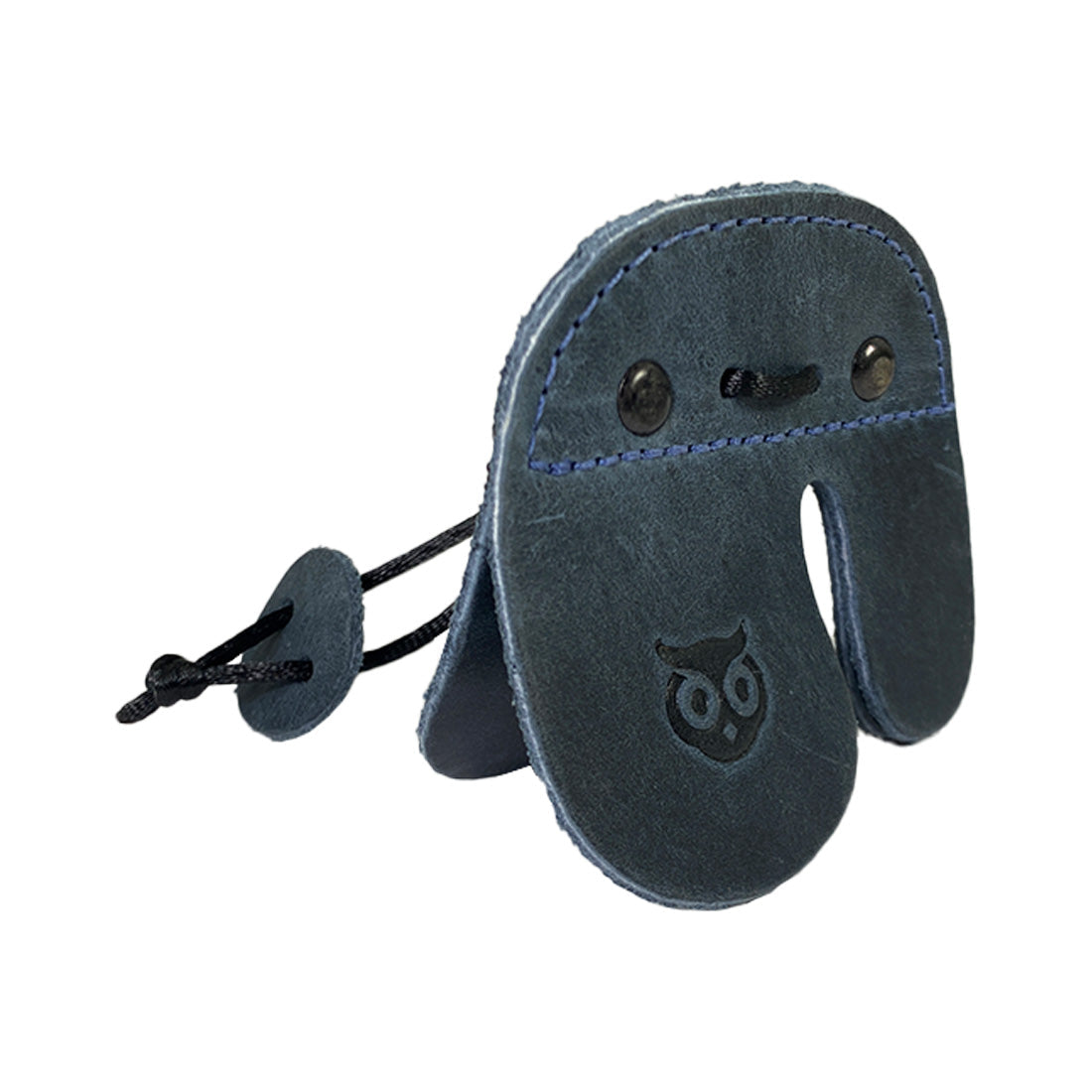 The Hide & Drink Left Handed Archery Finger Protector proudly displayed in a rich leather finish. This Archery Finger Tab functions as a Protect Guard for Recurve Bows, emphasizing its role in your shooting practice gear, crafted by artisans dedicated to quality production through StockyardX.
