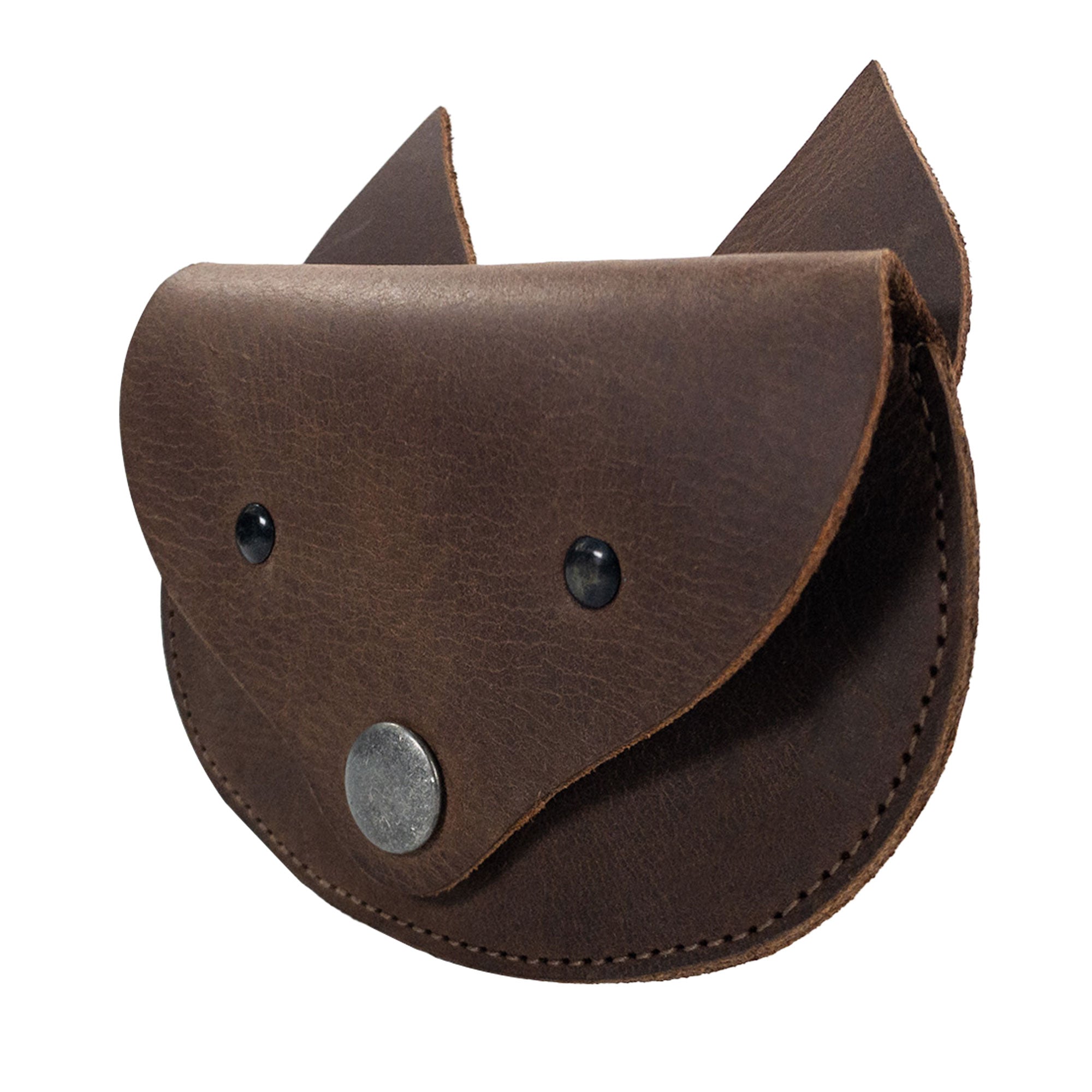 Side angle of the Foxy Head Shape Coin Pouch by Hide & Play, crafted from durable Full Grain Leather. This handmade piece reflects small batch production, with details like hand cut, hand sewn craftsmanship, and fire branding indicative of artisan traditions in La Antigua Guatemala & Oaxaca Mexico.
