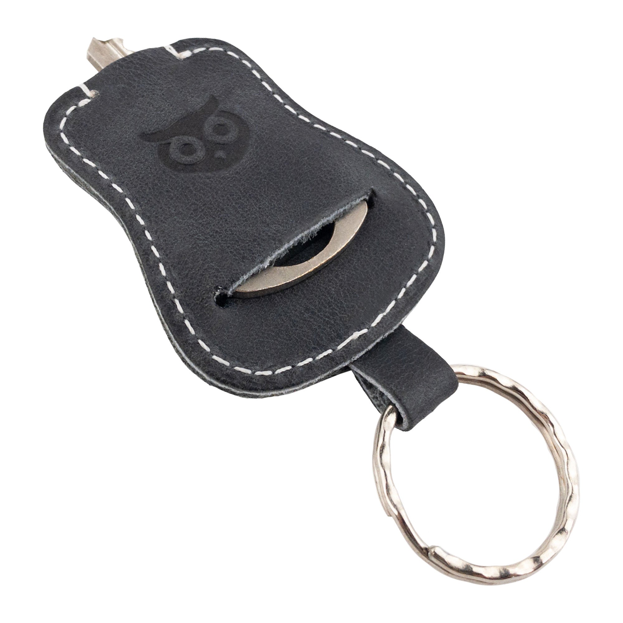 Black Guitar Keychain by Hide & Drink in a functional angle, showing the key holder's practical design. Handmade from Full Grain Leather, this keyring is a testament to the artisan skills from small batch production in La Antigua Guatemala & Oaxaca Mexico.