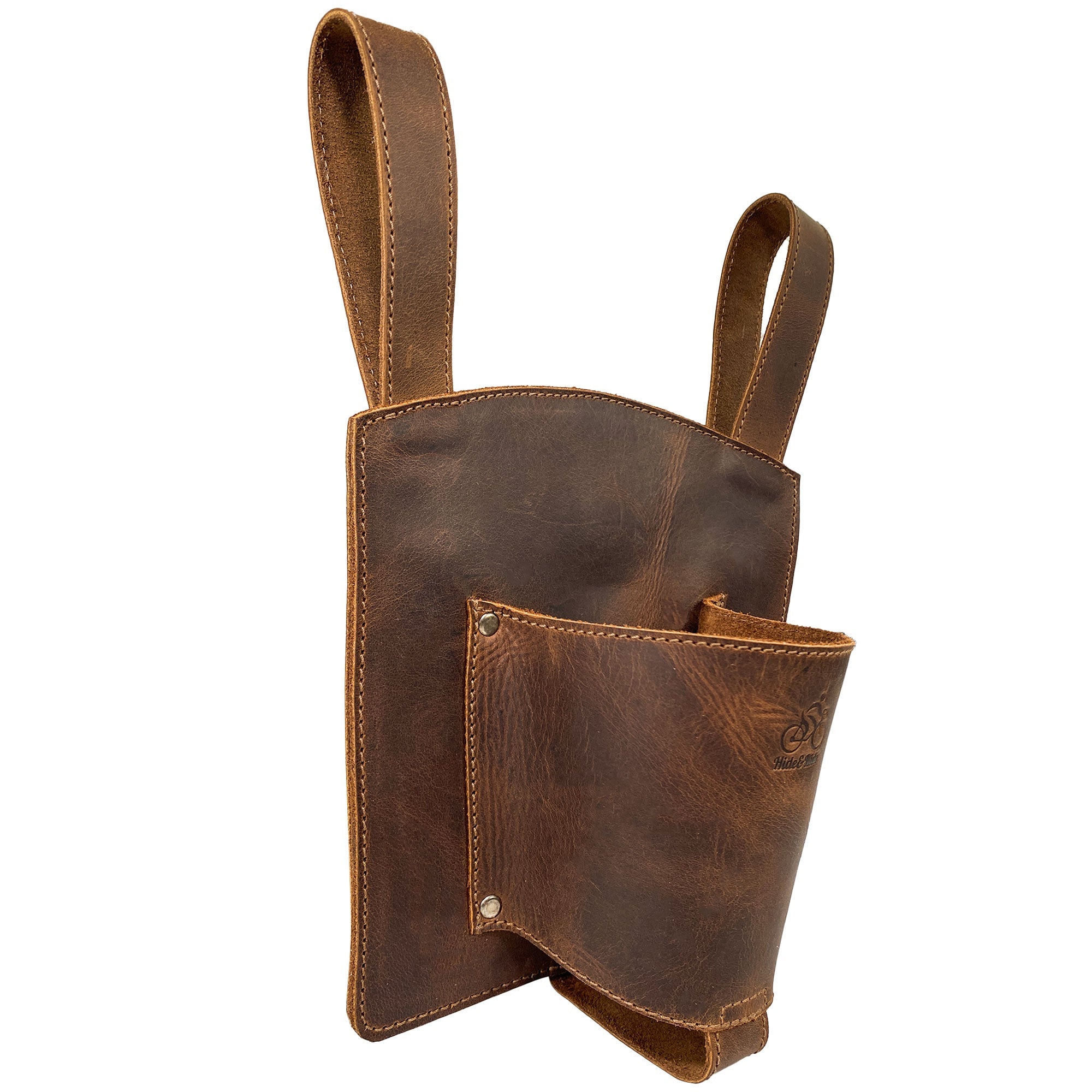 Side angle of the Bike Handlebar Cup Holder by Hide & Ride, illustrating its unique leather structure and stylish design. Bike Handlebar Cup Holder Handmade from Full Grain Leather - Beverage Pouch for Commuters, Minimalist Bikers, Cyclers, Urban Nomad, Full Grain Leather, StockyardX, Small Batch Production, Hand Cut, Hand Sewn, Fire Branded, Artisan, Handmade in La Antigua Guatemala & Oaxaca Mexico.