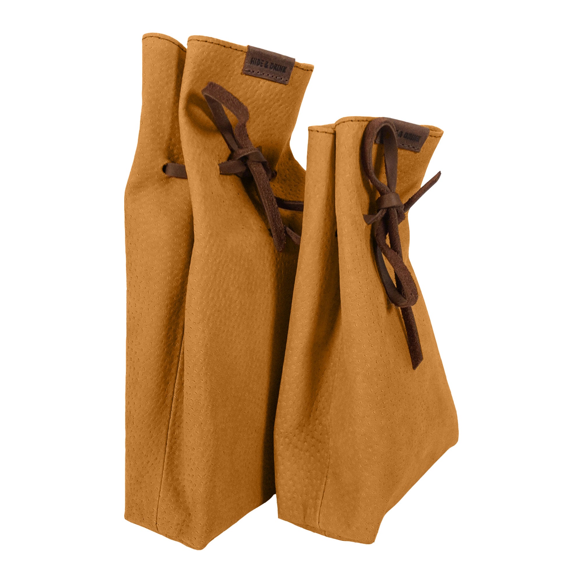 Showing the refined look of Hide & Drink's Drawstring Sack (2 pack) in a stylish color, perfect for any occasion. Drawstring Sack (2 pack) Handmade from Sheepskin and Full Grain Leather, StockyardX, Small Batch Production, Hand Cut, Hand Sewn, Fire Branded, Artisan, Handmade in La Antigua Guatemala & Oaxaca Mexico.