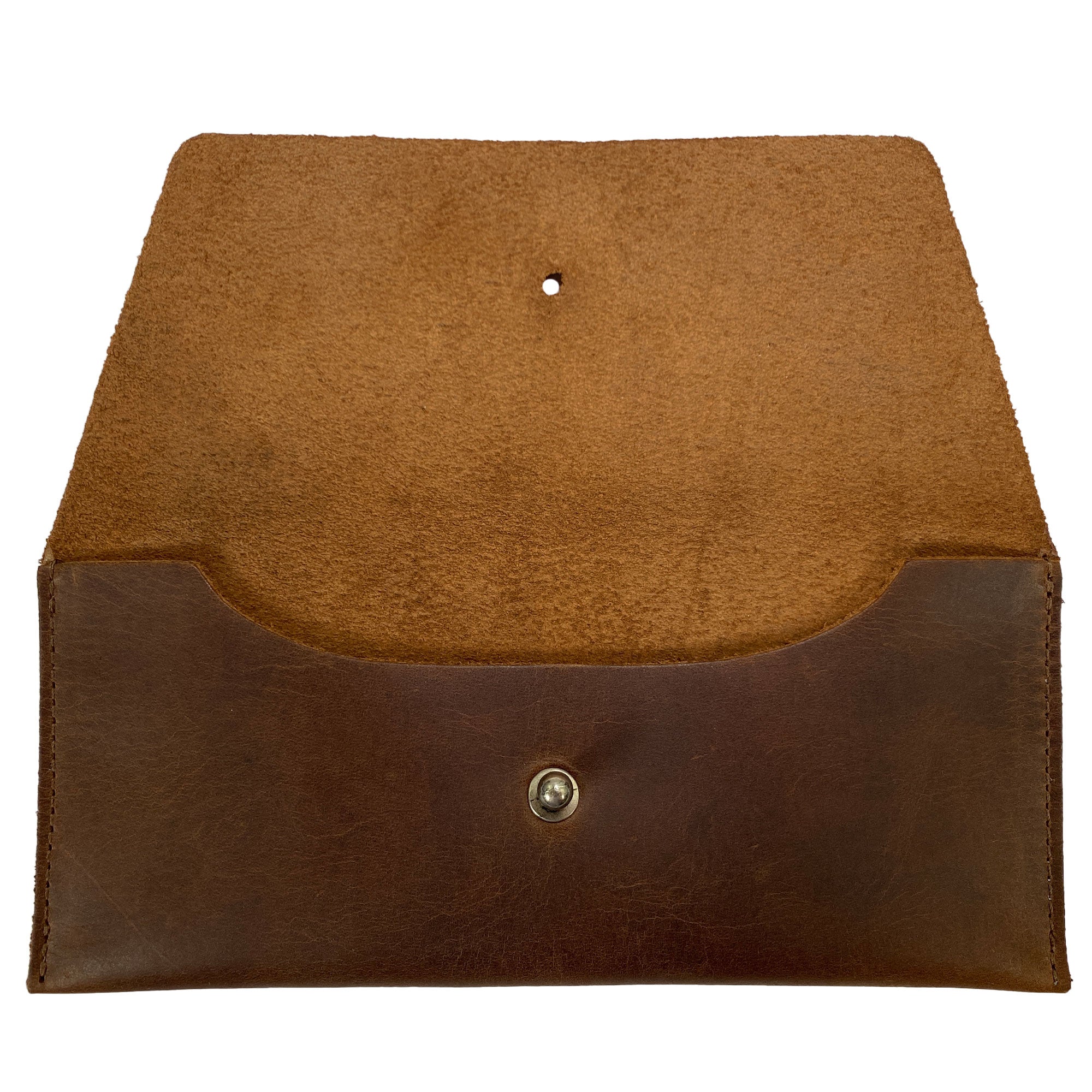 Inside view of Heather's Long Utility Pouch, designed for practical storage of cash and coins. This stylish wallet blends a vintage, minimalist aesthetic with the durability of full grain leather, produced by StockyardX through small batch artisan methods in La Antigua Guatemala. Every item is hand cut and hand sewn, fire branded for quality.