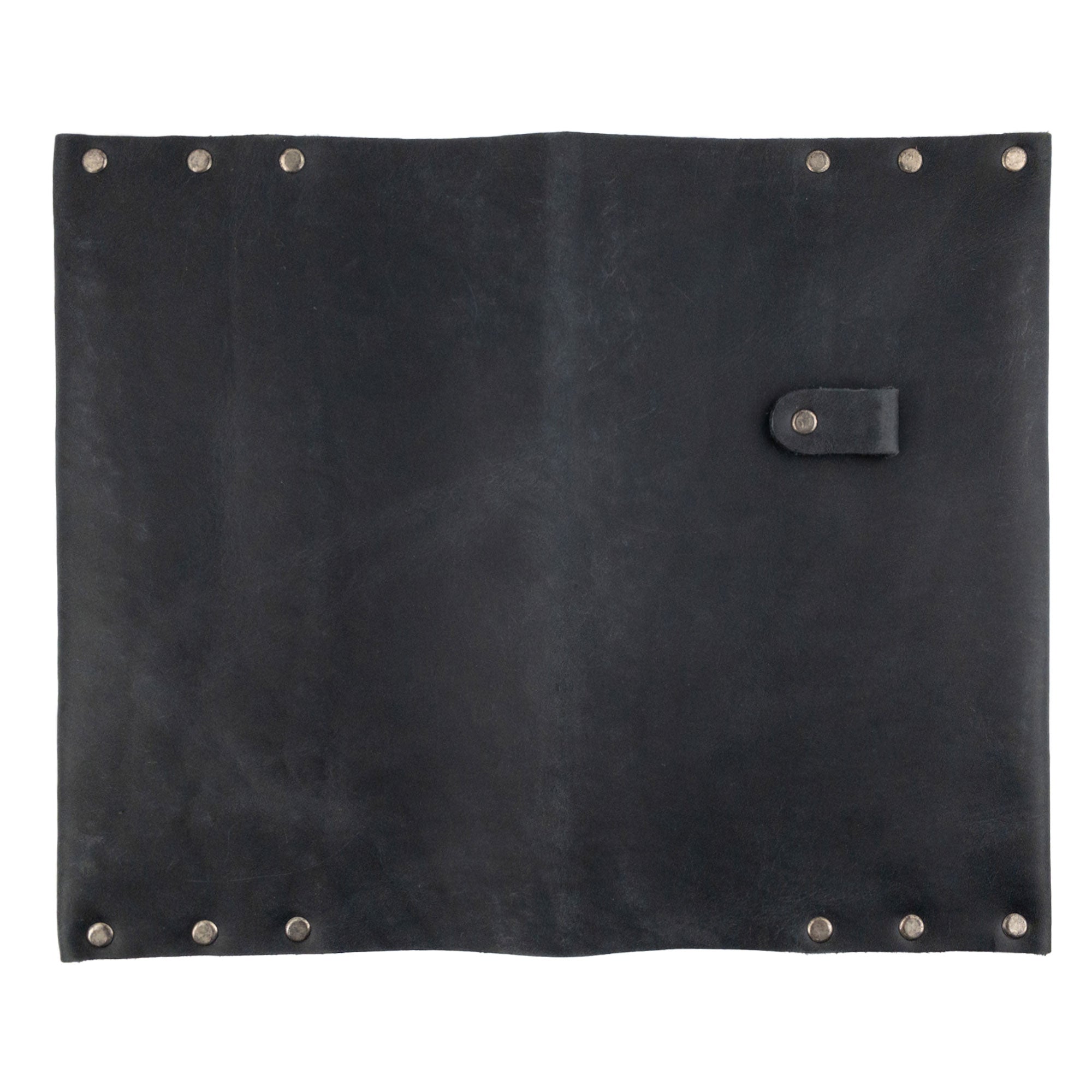 Showcasing the back of Hide & Drink's Riveted Journal Cover (5 x 8.50 in.), this image highlights the elegant form and quality of full grain leather. Each cover is hand sewn and made with attention to detail, ensuring a vintage appeal. Ideal for those who appreciate the Riveted Journal Cover for Notebook (5 x 8.50 in.) (Notebook Not Included), showcasing artisan craftsmanship from La Antigua Guatemala.