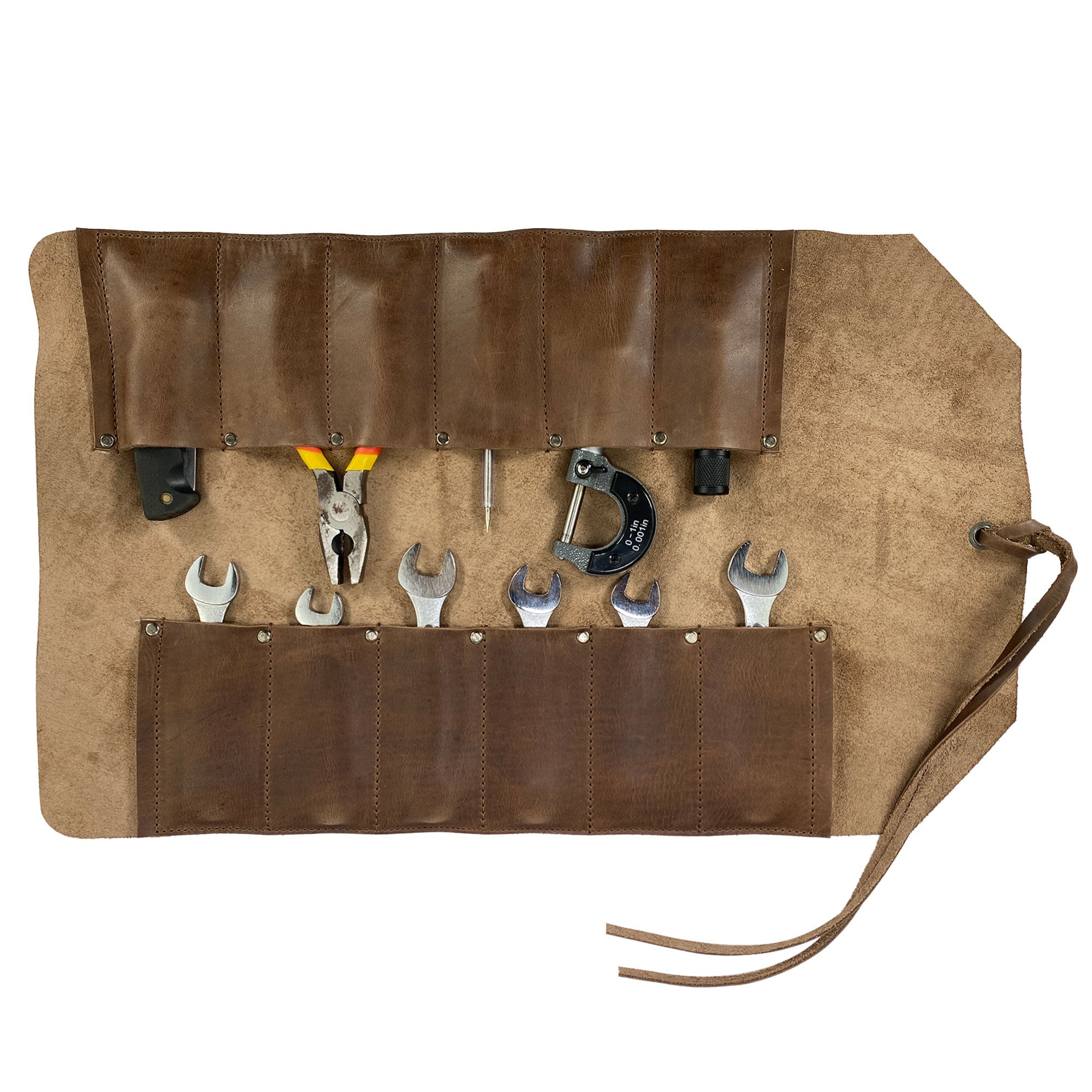 The 12 Pocket Tool Roll - Home Storage by Heavy Duty Hide, packed with tools to display its practical use. Made from artisan, hand sewn Full Grain Leather, this Big Tool Roll Up Bag is perfect for woodworking storage and showcases a vintage aesthetic.