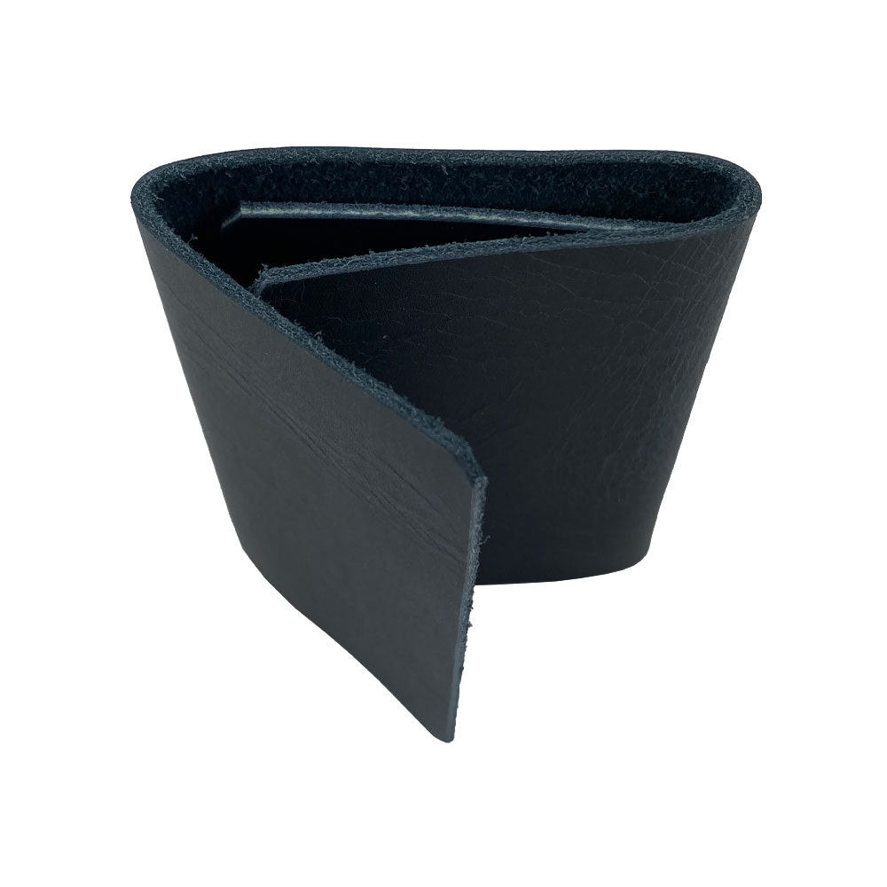 A crafted image of the Hide & Drink Minimalist Wallet Bills Only, beautifully made from premium Full Grain Leather. This Ultra Minimalist Wallet serves as an ideal cash organizer, highlighting the artisan techniques of small batch production and hand sewn craftsmanship.