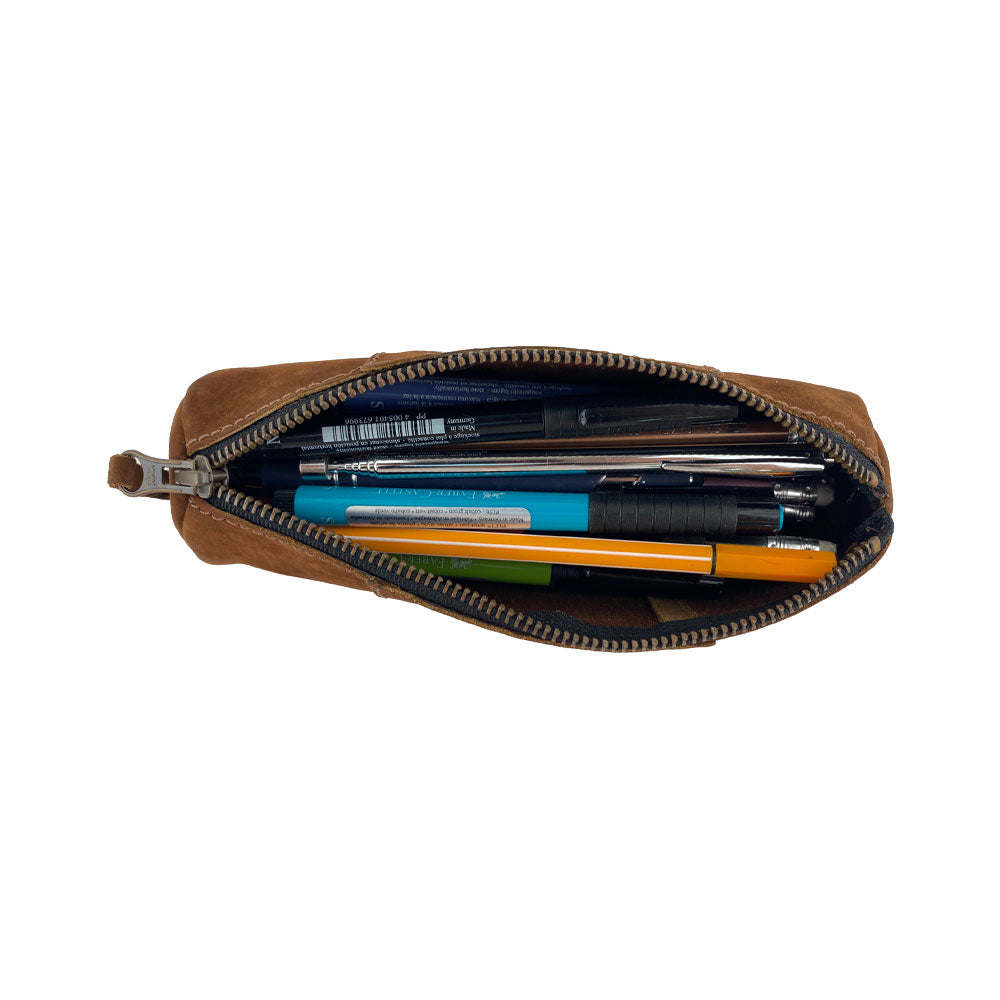 Utility Cylinder Case by Hide & Drink loaded with office supplies, showcasing its handmade craftsmanship and utility. This classic bag made from Full Grain Leather is perfect for organizing personal items. Cylinder Case, Handmade, Rustic.