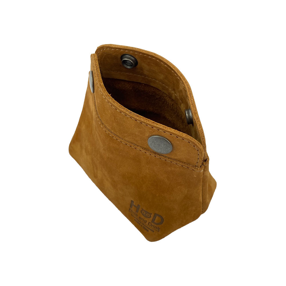 Interior shot of Hide & Drink Double Snap Pouch, showcasing its practicality as a cash & card holder or makeup organizer. This durable full grain leather product is handmade in La Antigua Guatemala.