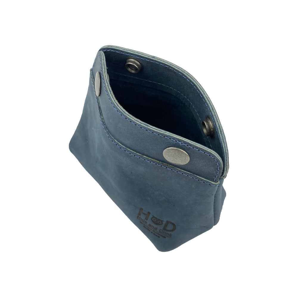 Interior look of the Hide & Drink Double Snap Pouch showcasing its utility as a cash & card holder and makeup organizer. Handcrafted from durable full grain leather in La Antigua Guatemala.