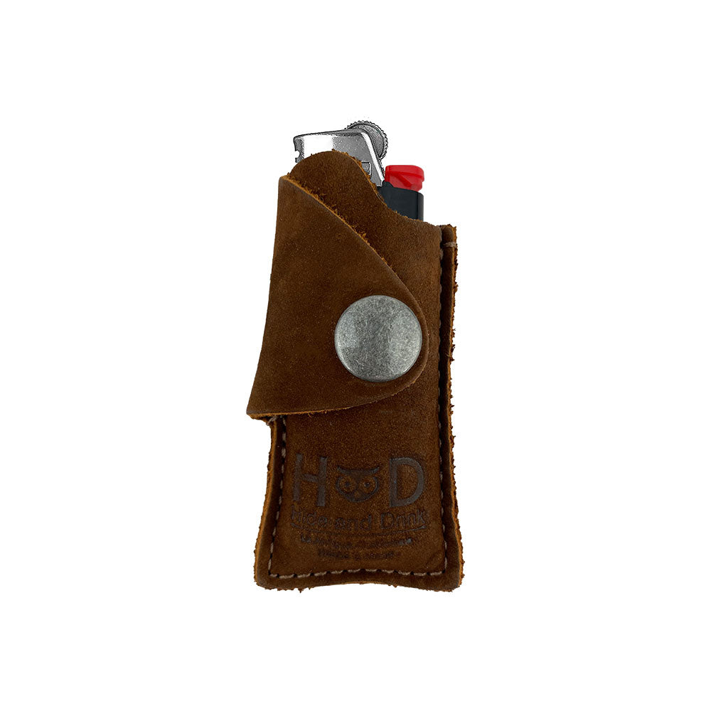 Hide & Drink Lighter Protective Case in a rich brown tone, designed to showcase the artisan quality of full grain leather. This sturdy case is handmade in La Antigua Guatemala & Oaxaca Mexico. Keywords: Lighter Protective Case, Full Grain Leather, Artisan.