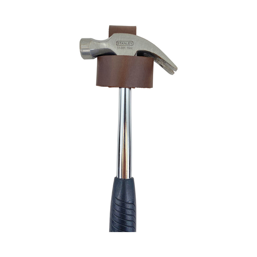 Large Hammer Holster by Hide & Drink, demonstrating its function as a waist axe holster while holding a hammer securely in place. Constructed with high-quality full grain leather, this rustic tool organizer is perfect for artisans. Handmade in Oaxaca Mexico for superior durability.