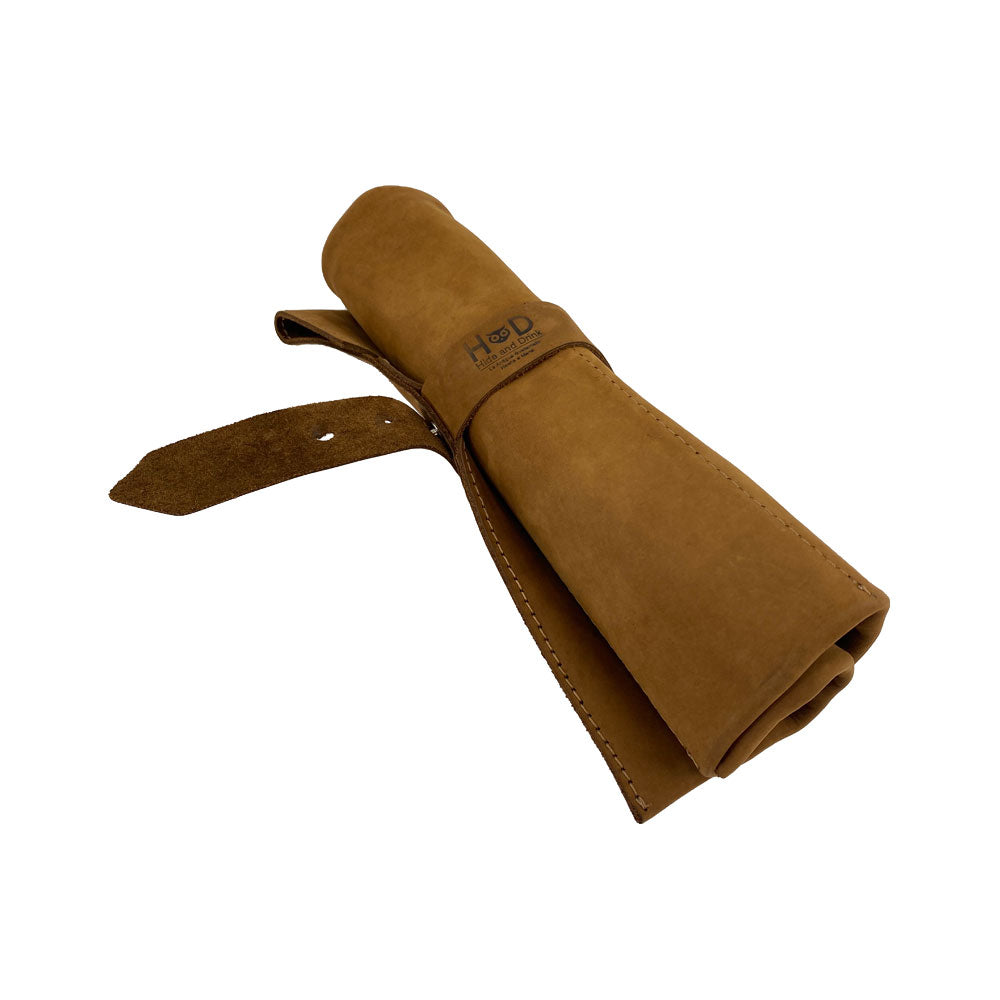 Hide & Drink's Large Tool Roll, skillfully crafted for effective organization. This Portable Carry-On Pouch features 6 slots optimized for woodworking tools storage. Constructed from waxed canvas and full grain leather variations, this artisan product highlights the quality of small batch production, handmade in La Antigua Guatemala & Oaxaca Mexico.