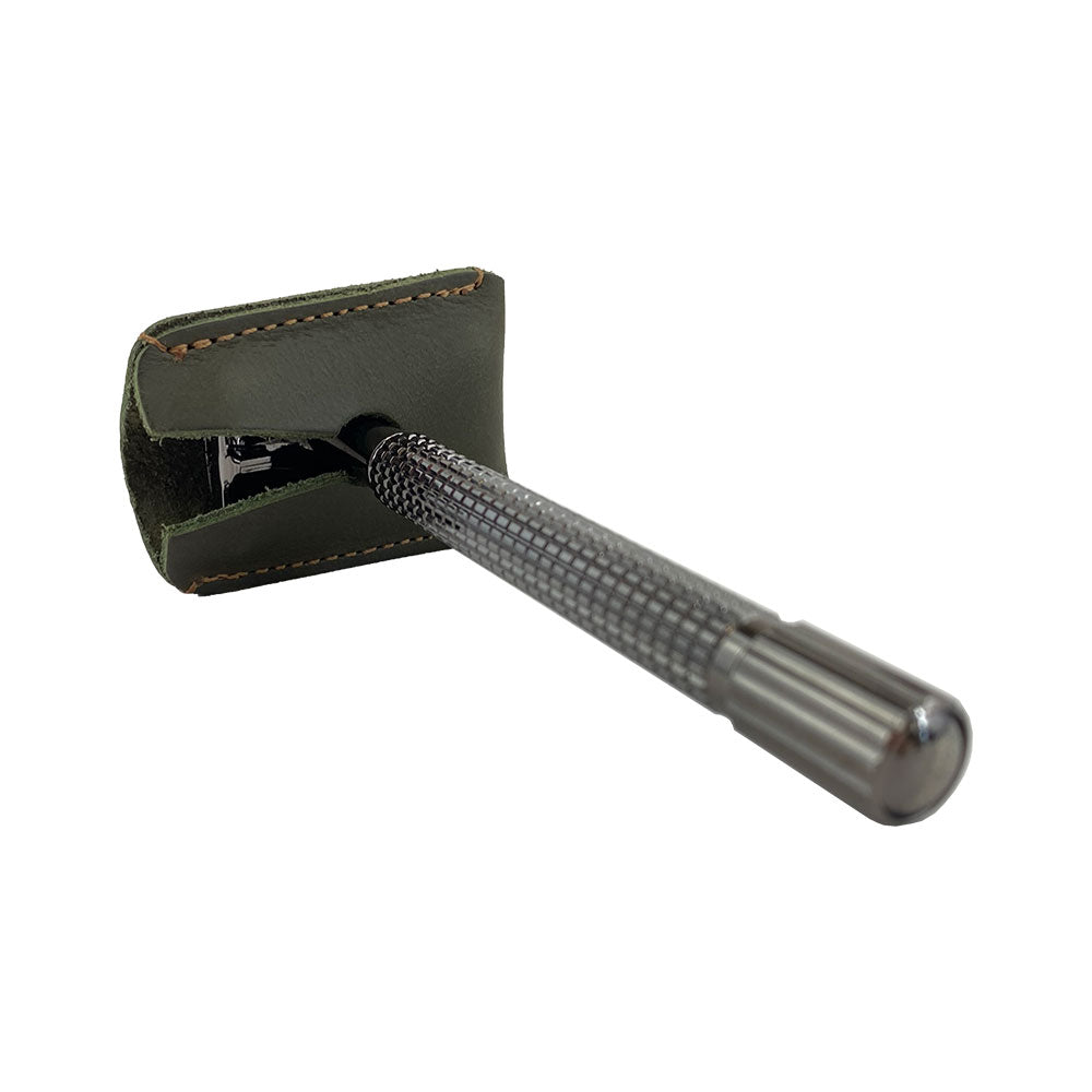 Side angle of Razor Head Cover by Hide & Drink featuring a double edge safety razor snugly protected by the exquisite full grain leather sheath, highlighting artisanal craftsmanship from La Antigua Guatemala & Oaxaca Mexico.