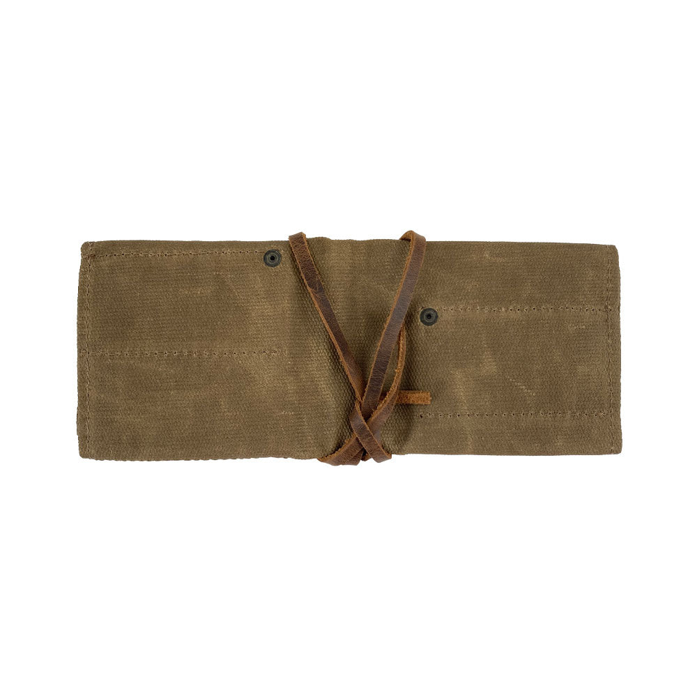 Hide & Drink Tool Roll introduces a sophisticated small tool roll-up bag with 10 slots, made from fine full grain leather. This portable carry-on pouch excels in organizing woodworking tools, making it essential for any workshop storage. Handmade in La Antigua Guatemala & Oaxaca Mexico, each product highlights artisan skill.