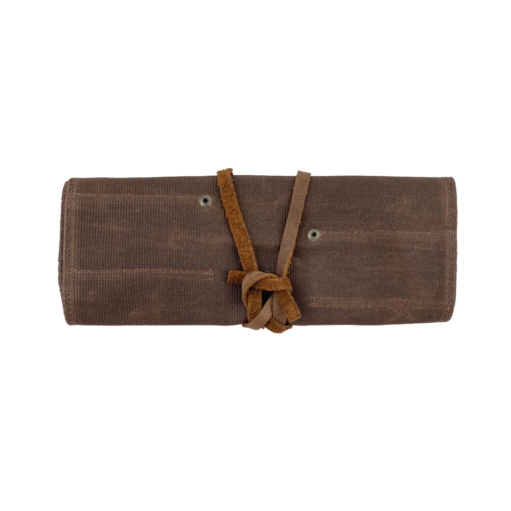 Hide & Drink Tool Roll features a durable small tool roll-up bag with 10 slots, made from quality full grain leather. This portable carry-on pouch is perfect for effective woodworking tools organization and enhancing workshop storage options. Every item is handmade in La Antigua Guatemala & Oaxaca Mexico, reflecting artisan dedication.