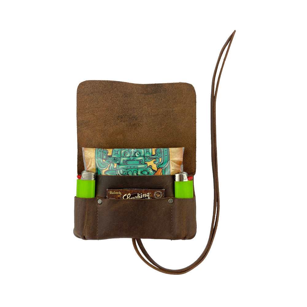 Open Hide & Drink Tobacco Pouch displaying neatly organized smoking supplies, perfect for keeping your tobacco and lighters ready, crafted from artisan full grain leather.
