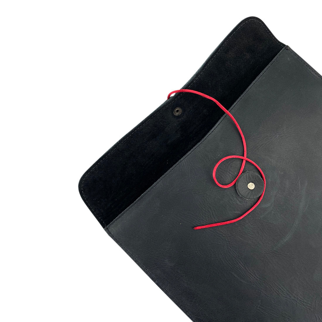 Unique view of the Mailing Envelope Folder by Hide & Drink, demonstrating its elegant closure. This Mailing Envelope Document Holder is perfect for providing a sophisticated look in any office or personal setting, handmade from Full Grain Leather in Oaxaca Mexico.