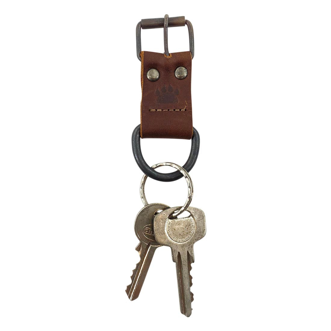 Taco Dog's Dog Collar Keychain with keys attached, demonstrating its practical use and stylish appearance. This lightweight and functional accessory, made from full grain leather, is perfect for dog lovers and reflects small batch, artisan handmade quality in La Antigua Guatemala & Oaxaca Mexico.
