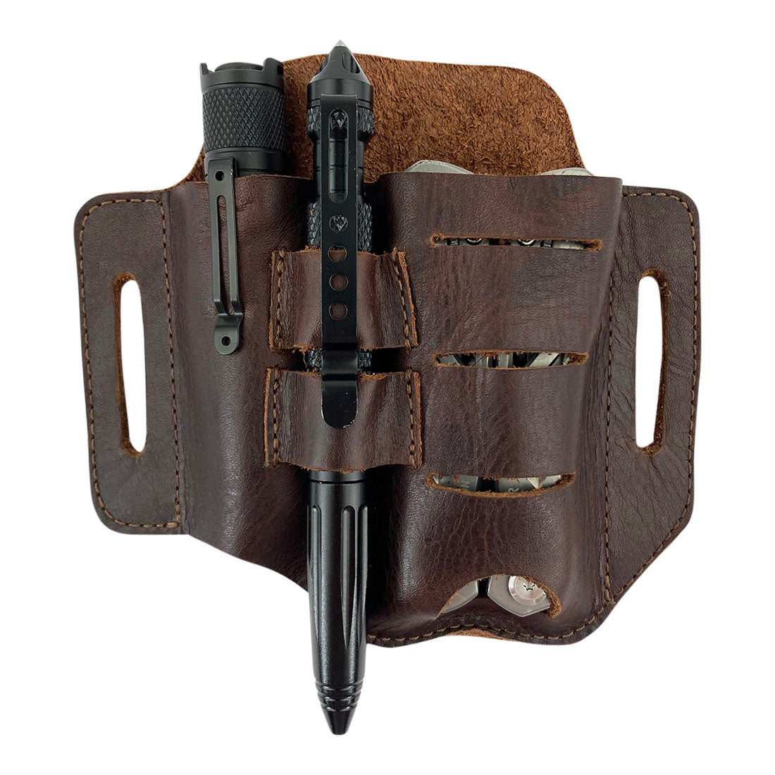 Urban Tactical Tool Holster by Hide & Drink, designed with tools and a pen for easy access. This Urban Tactical Tool Holster - Durable Accessory for Carrying Tools with Easy Belt Attachment - Great for Multi-Tool, Pliers, Flashlight, showcases excellent hand-sewn quality, artisan made in La Antigua Guatemala & Oaxaca Mexico.