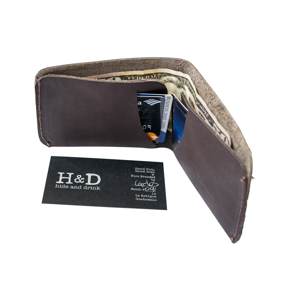 Closed view of the Hide & Drink Minimal Wallet showcasing its timeless design in Full Grain Leather. This Classic Slimfold Wallet serves a dual function as a Card Organizer Holder and Travel Accessory, crafted with care as part of Small Batch Production by artisans in La Antigua Guatemala & Oaxaca Mexico.