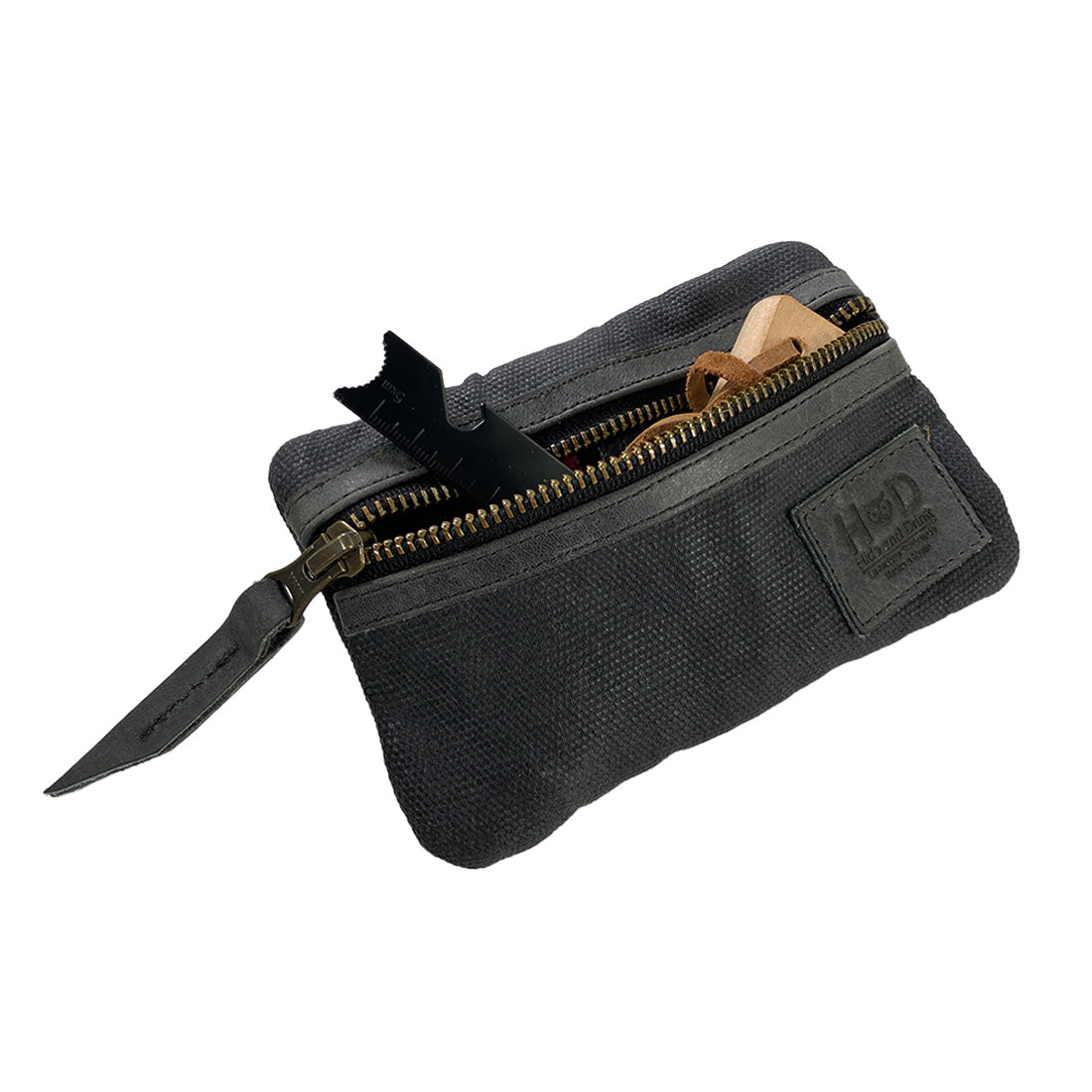 Detailed view of the Multi-tool Pocket Pouch by Hide & Drink, highlighting its spacious interior, making it perfect as a compact multipurpose tool case.