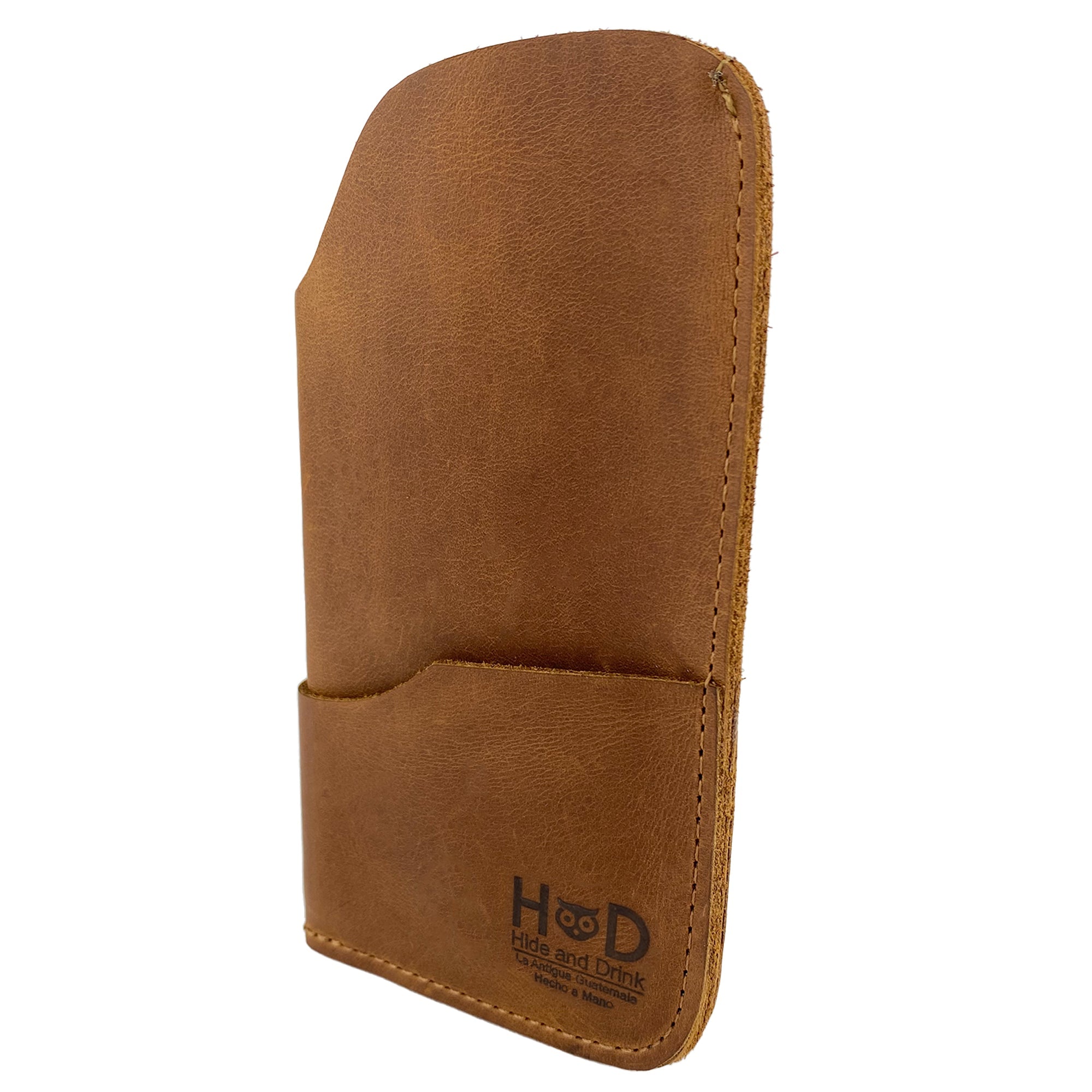 The Hide & Drink Sunglass Case & Wallet intricately designed in dark brown leather, ideal for everyday use. This Rustic Sunglasses Case & Wallet integrates Full Grain Leather artistry as a stylish glasses sleeve for travel, crafted with skill in La Antigua Guatemala & Oaxaca Mexico.