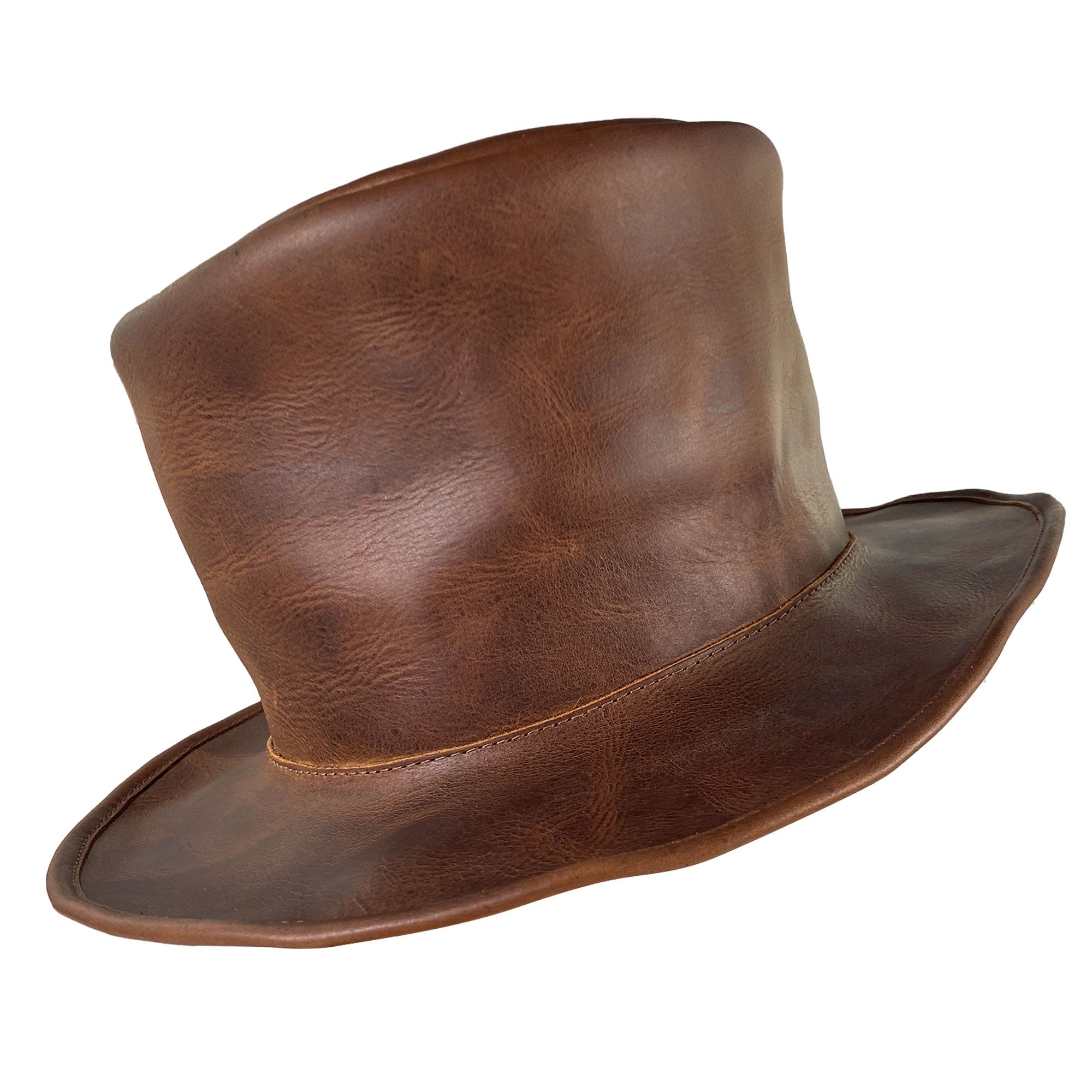 A stylish side view of the Hide & Play Top Hat, emphasizing its classic design and rich leather tones. This Mad Hatter Top Hat is perfect for cosplay, Halloween, performances, films, and shows. With full grain leather construction, it reflects small batch production, hand cut, hand sewn craftsmanship, and fire branding by artisans in La Antigua Guatemala and Oaxaca Mexico.