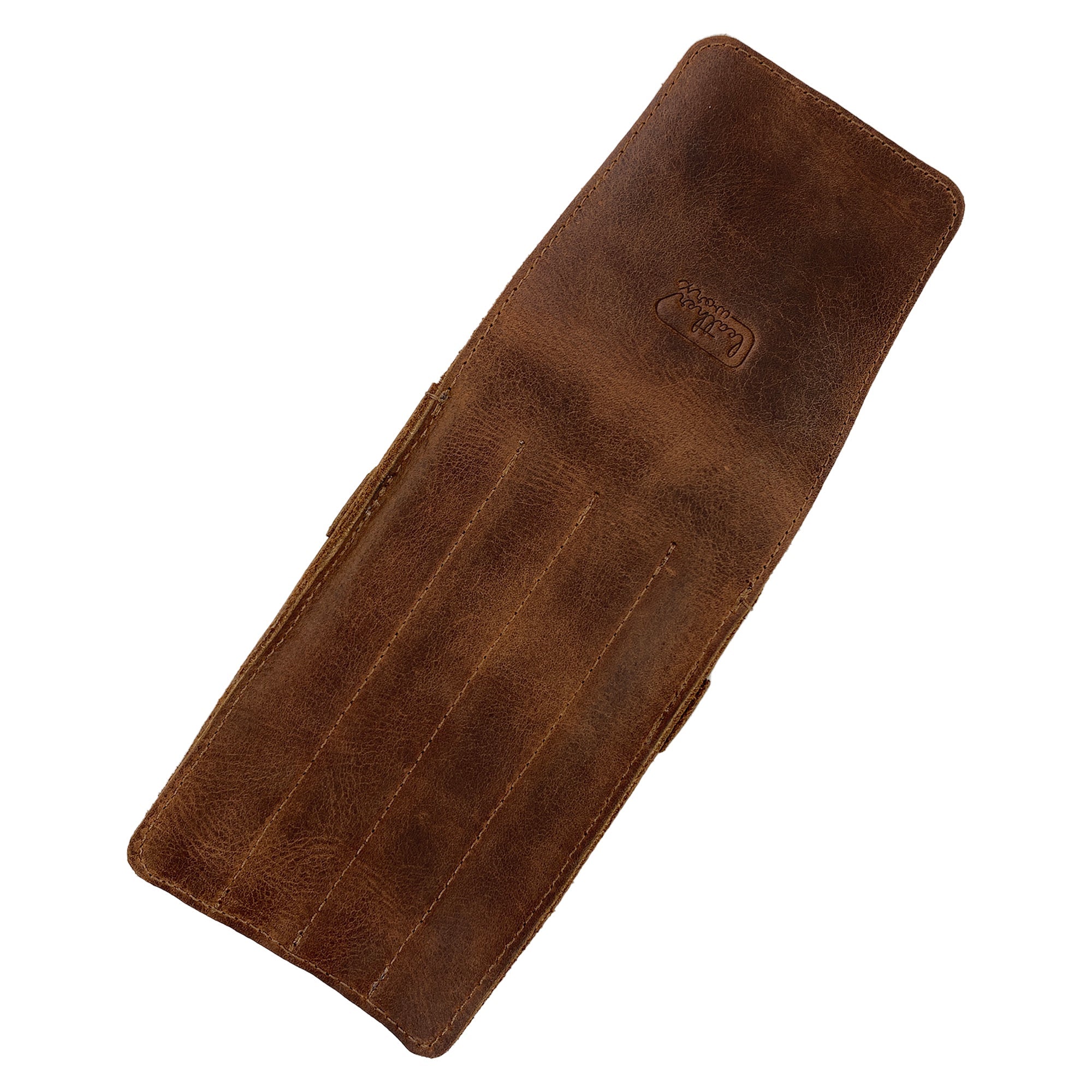 Inside view of the Leather Worx 4-Pen Holder, presenting the soft suede interior in brown full grain leather, designed to securely hold writing instruments. A true testament to artisan craftsmanship, this pencil case reflects small batch production and hand sewn details, crafted in La Antigua Guatemala.
