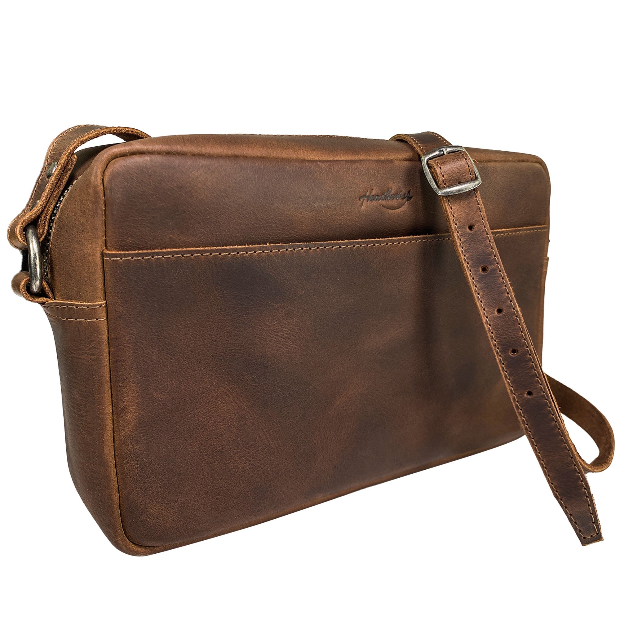 Angled view of Heather's Rectangular Crossbody Bag, showcasing craftsmanship and practicality. This stylish shoulder bag is perfect for everyday use or travel, made from premium full grain leather. Squared Crossbody Bag - Stylish Shoulder Bag for Everyday Use or Travel, Full Grain Leather, StockyardX, Small Batch Production, Hand Cut, Hand Sewn, Fire Branded, Artisan, Handmade in La Antigua Guatemala & Oaxaca Mexico.