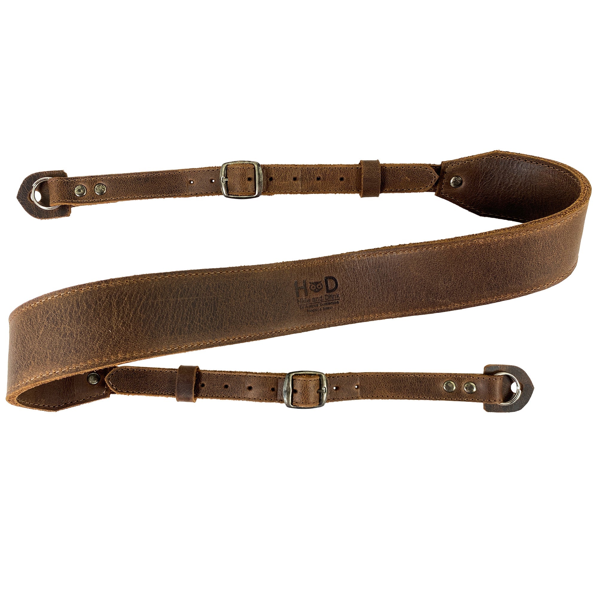 Hide & Drink Rustic Camera Strap laid out flat, demonstrating its premium Full Grain Leather craftsmanship. This adjustable strap is perfect for mirrorless and compact cameras and makes a wonderful gift for photography lovers. StockyardX, Small Batch Production, Hand Cut, Hand Sewn, Fire Branded, Artisan, Handmade in La Antigua Guatemala & Oaxaca Mexico.