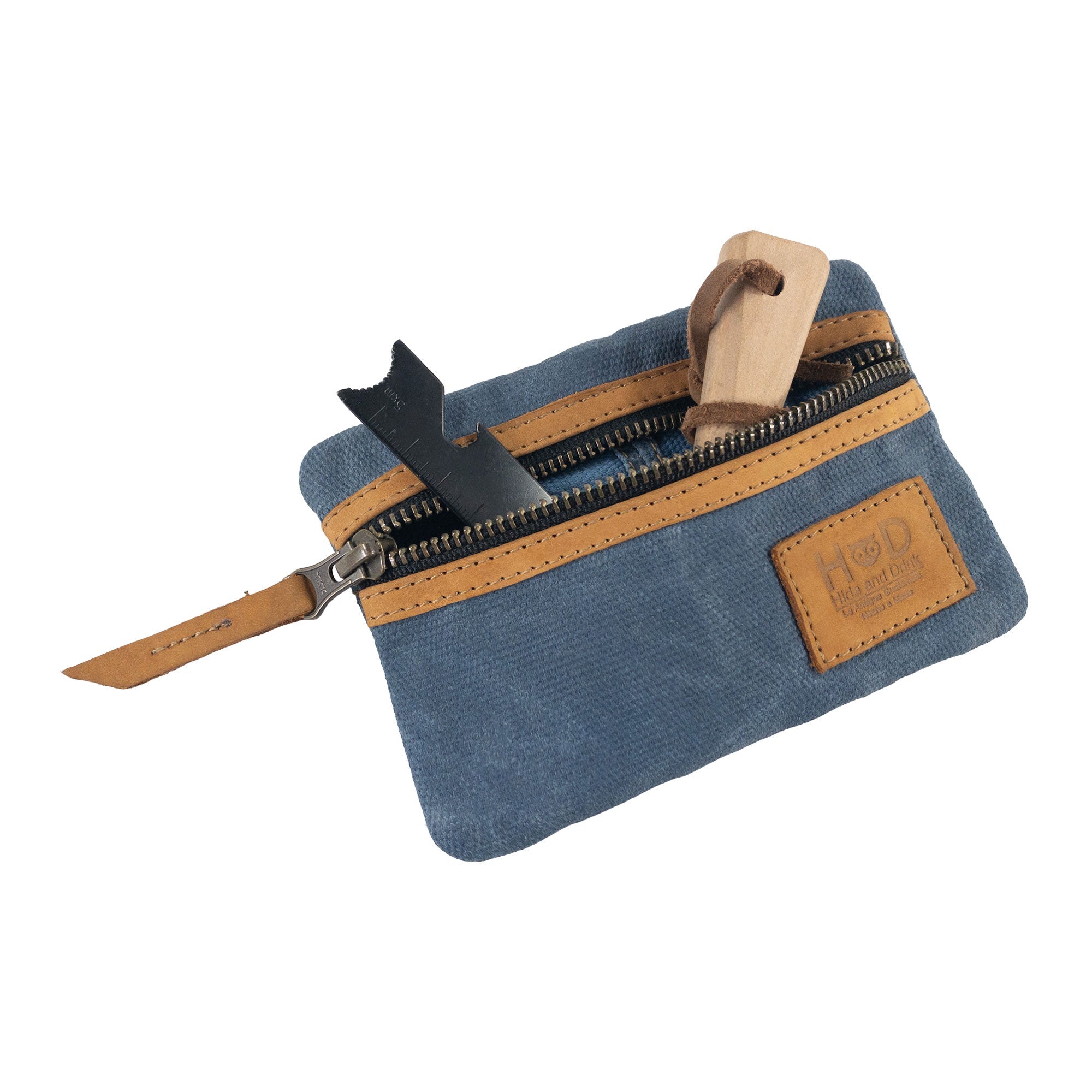 Open grey Multi-tool Pocket Pouch by Hide & Drink, illustrating space for multiple tools and everyday essentials.
