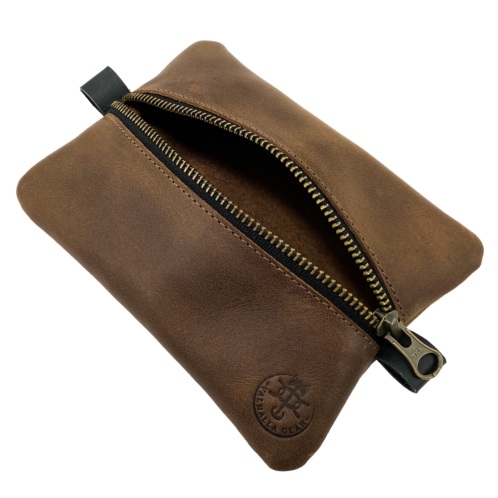 Open view of the EDC Zippered Pouch by Valhalla Gear, revealing its spacious interior suitable for small personal items or tools. Made from full grain leather, this accessory bag represents high-quality small batch production, hand cut and sewn by artisans in La Antigua Guatemala.