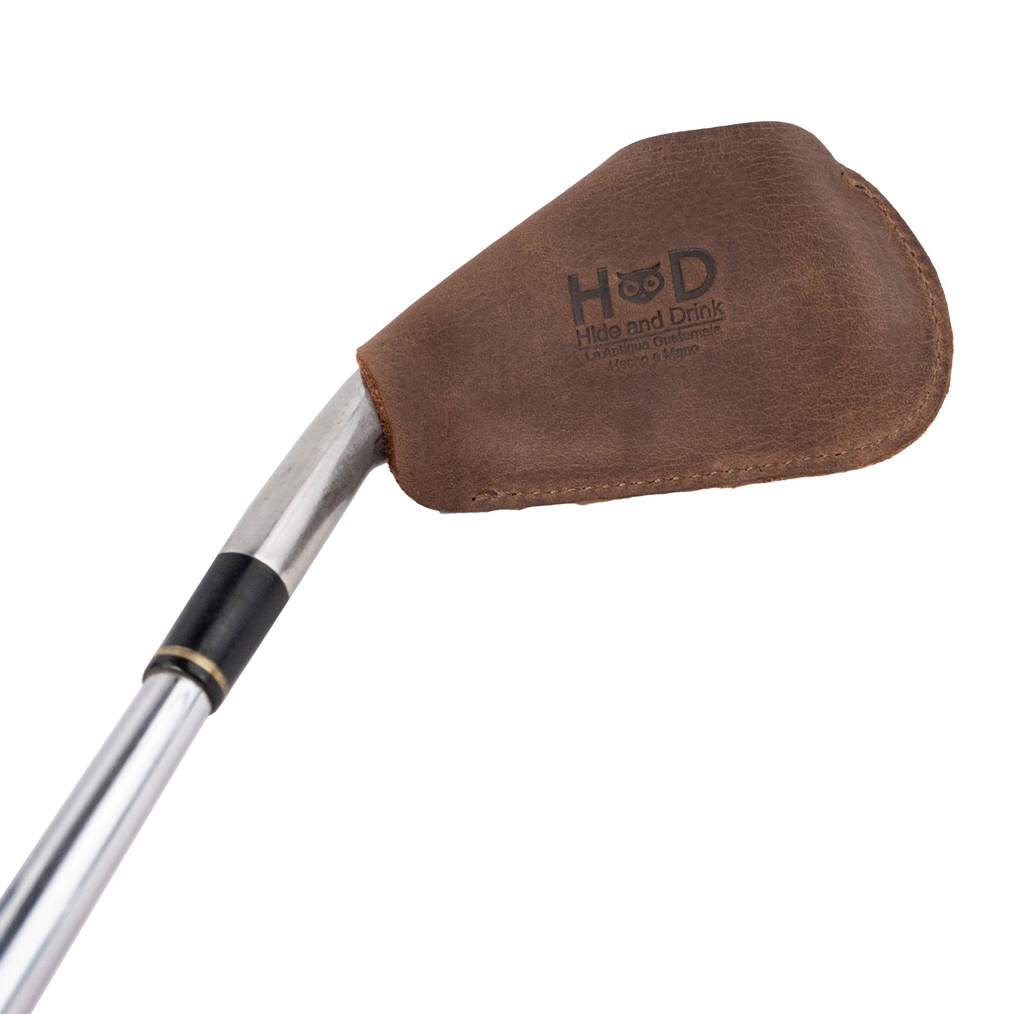 Functional Golf Club Cover from Hide & Drink, designed for protecting your golf clubs with a durable, artisan-crafted full grain leather exterior. This small batch production headcover is hand cut, hand sewn, and fire branded, making it a stylish and practical accessory for outdoor golf.